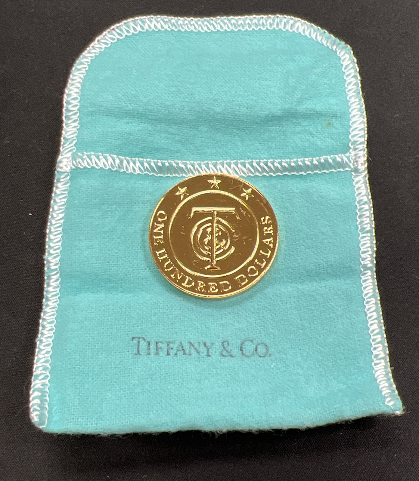 Tiffany & Co. $100 Tiffany Money Coin w/ Tiffany Blue Pouch Rim Stamped Tiffany