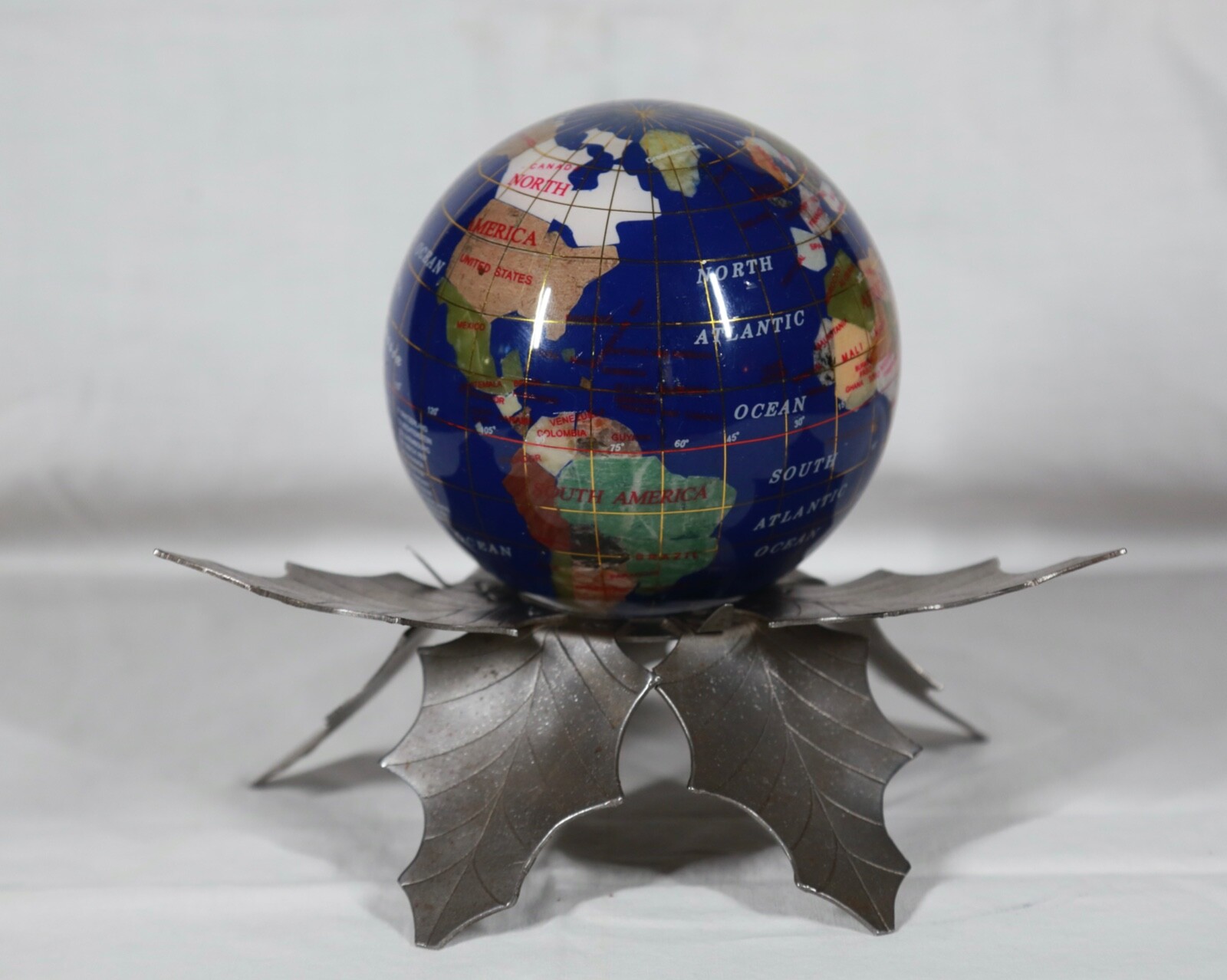 RARE! VINTAGE BLUE INLAID STONE GLOBE PAPERWEIGHT SITTING ON PEWTER LEAF STAND