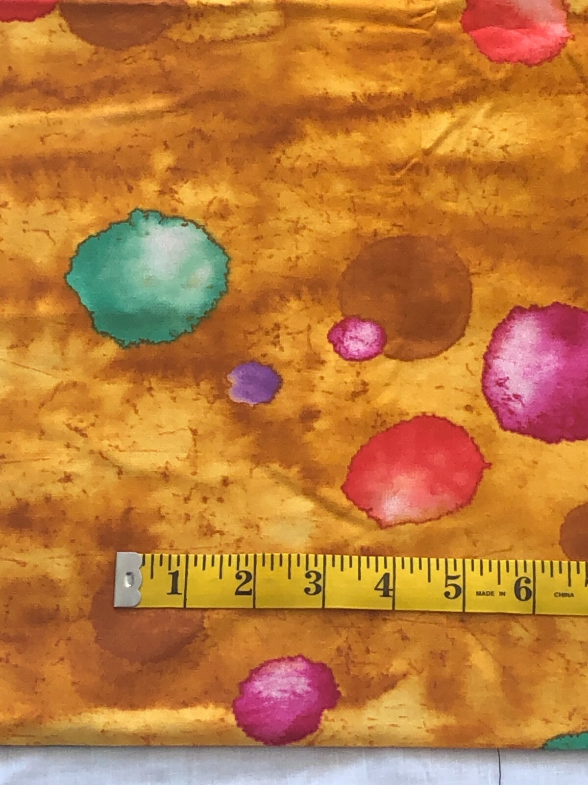 "Bubbles" fabric for Benartex Style 316. By the 1/2 yd. Gold w/ bold circles.
