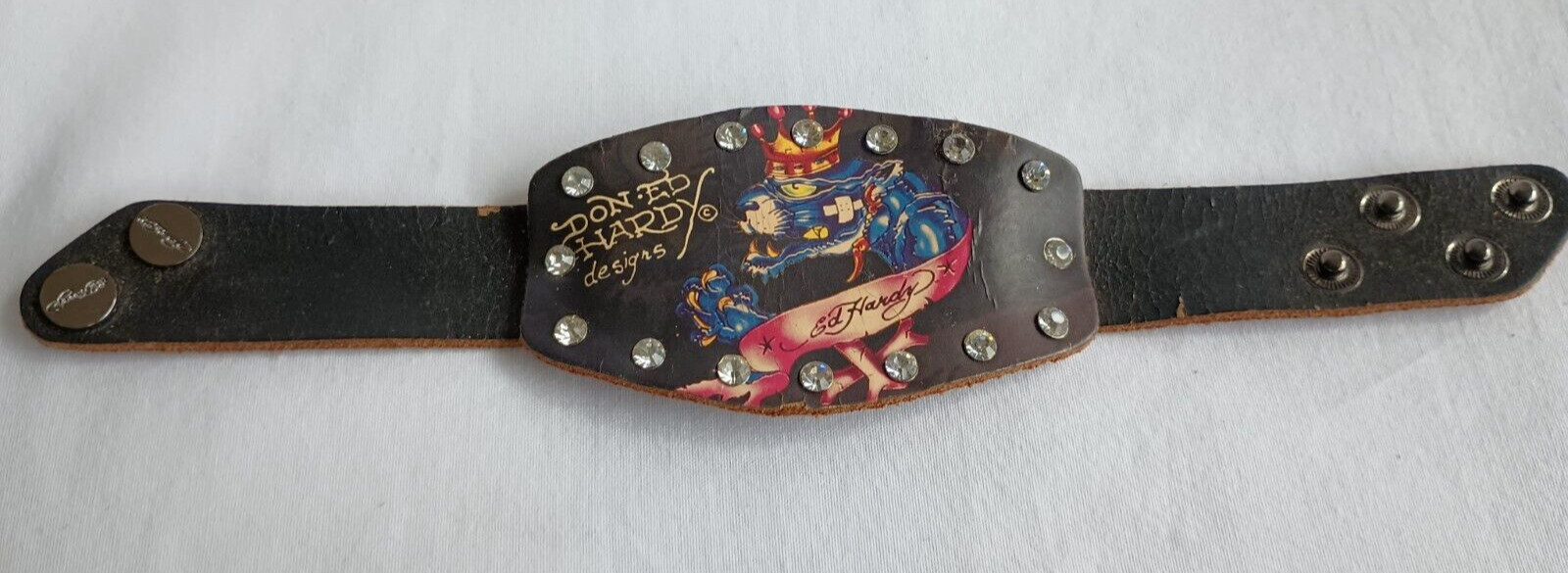 Don - Ed Hardy Designs Jeweled Leather Crowned Bandaged Big Blue Cat Wristband