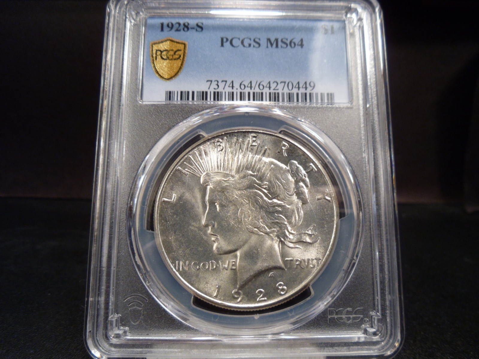 1928-S MS64 Peace Dollar PCGS Certified - White/Gold Shield Holder