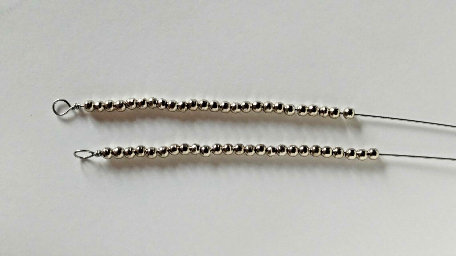 50 1/8" Brass Beads, nickel plated. U.S. Made for Fishing applications 5018nb.