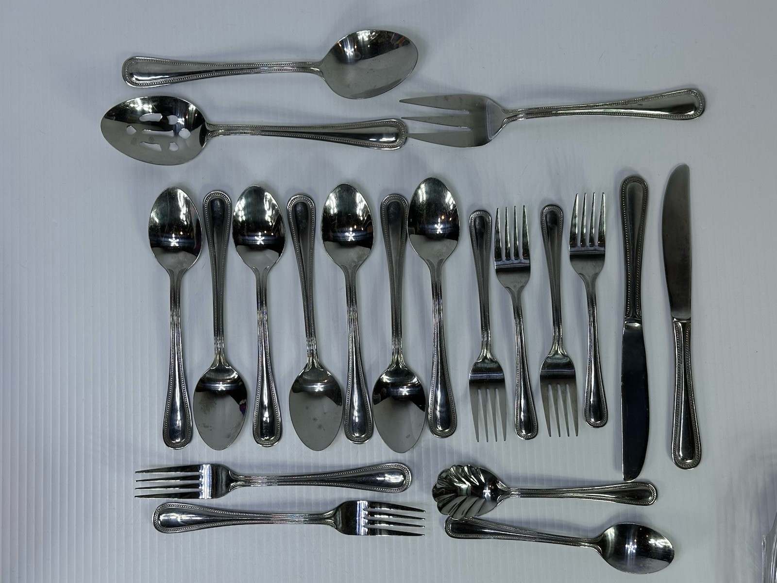 International Stainless CHINA BEAD Flatware Set of 20