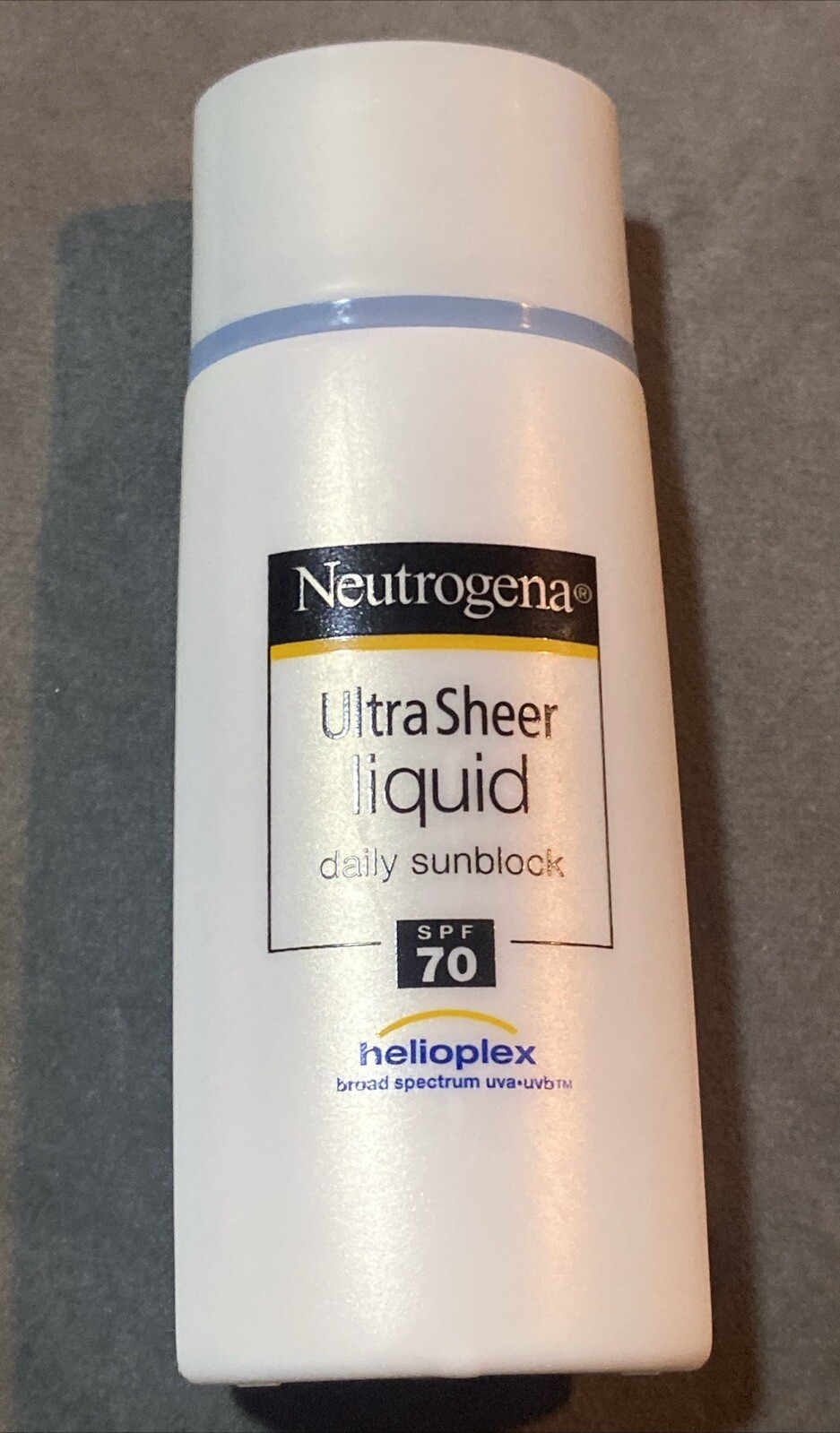 Neut. Ultra Sheer Liquid Daily Facial Sunscreen Broad Spectrum SPF 70 Helioplex