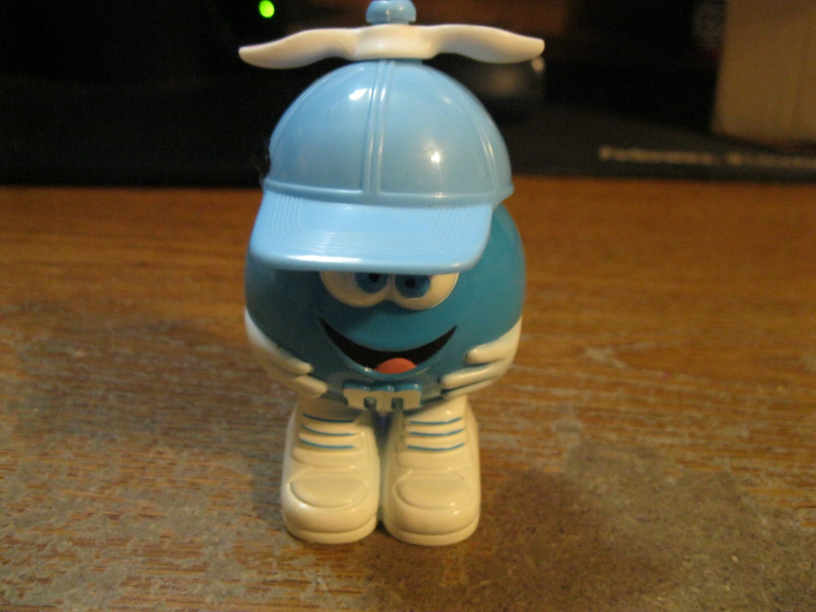 M&M Candy Container Blue Figurine with Blue Beanie Propeller Hat