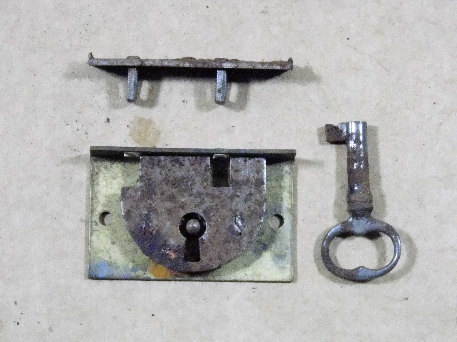 Antique miniature chest lock.
