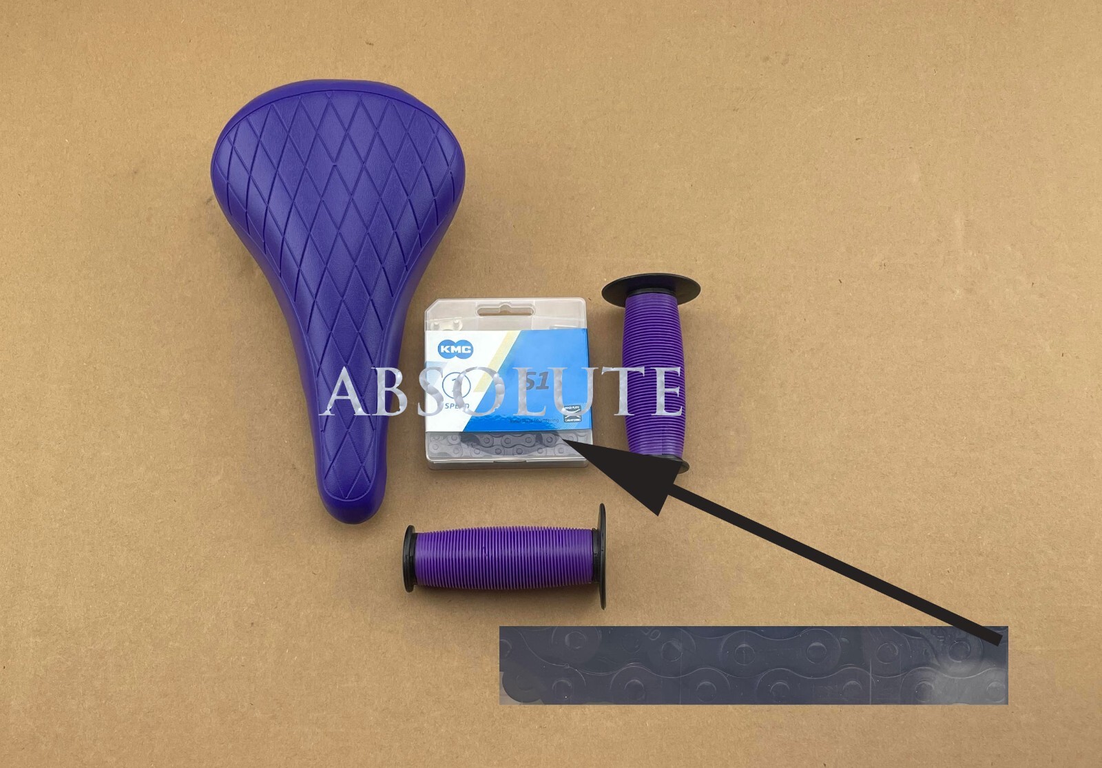 PURPLE DIAMOND STITCHED BMX BIKE SADDLE W/BMX KMC CHAIN &MUSHROOM STYLE GRIPS.