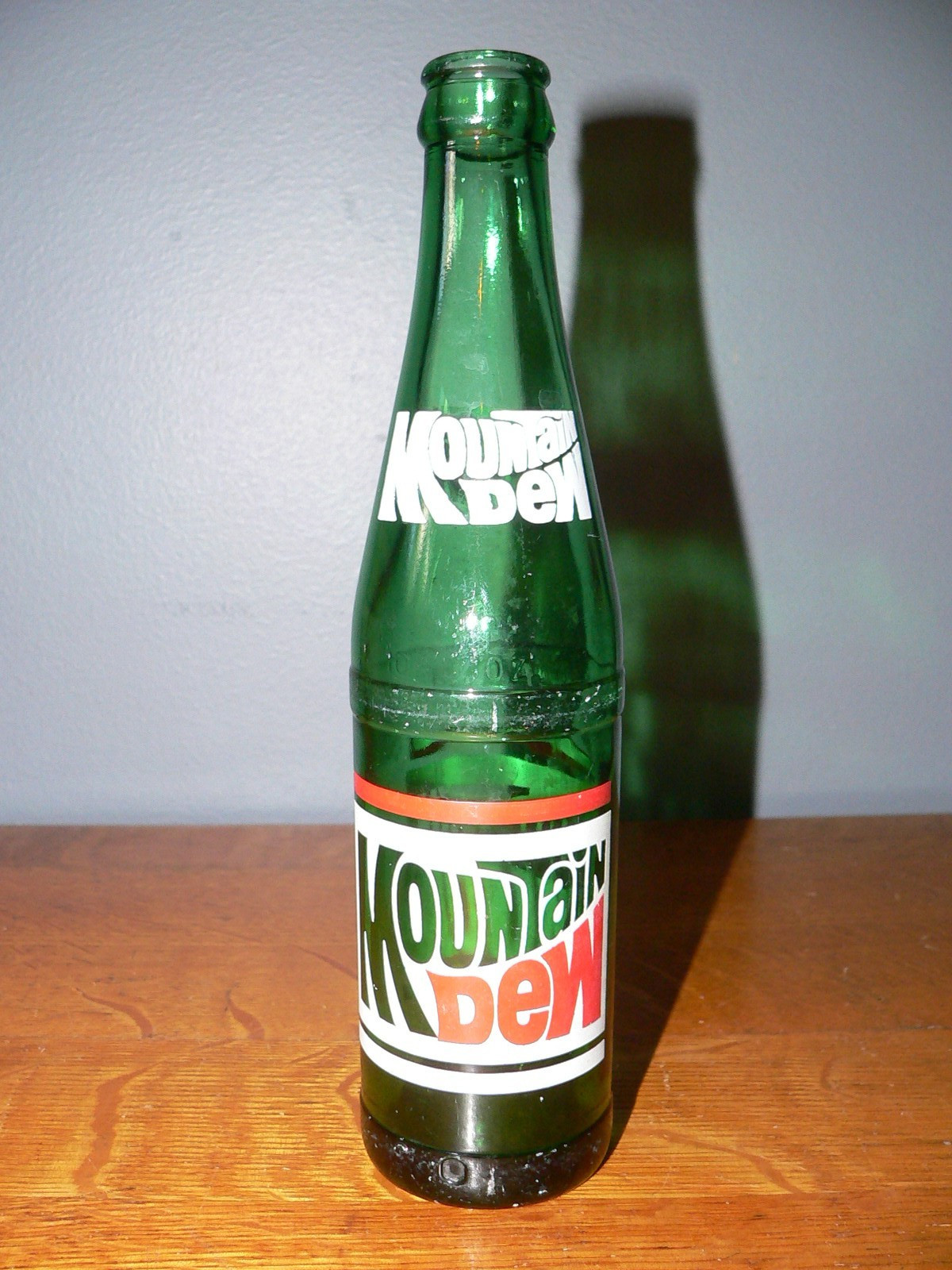 Vintage Mountain Dew Empty 10 oz Bottle with Red & White Classic Logo
