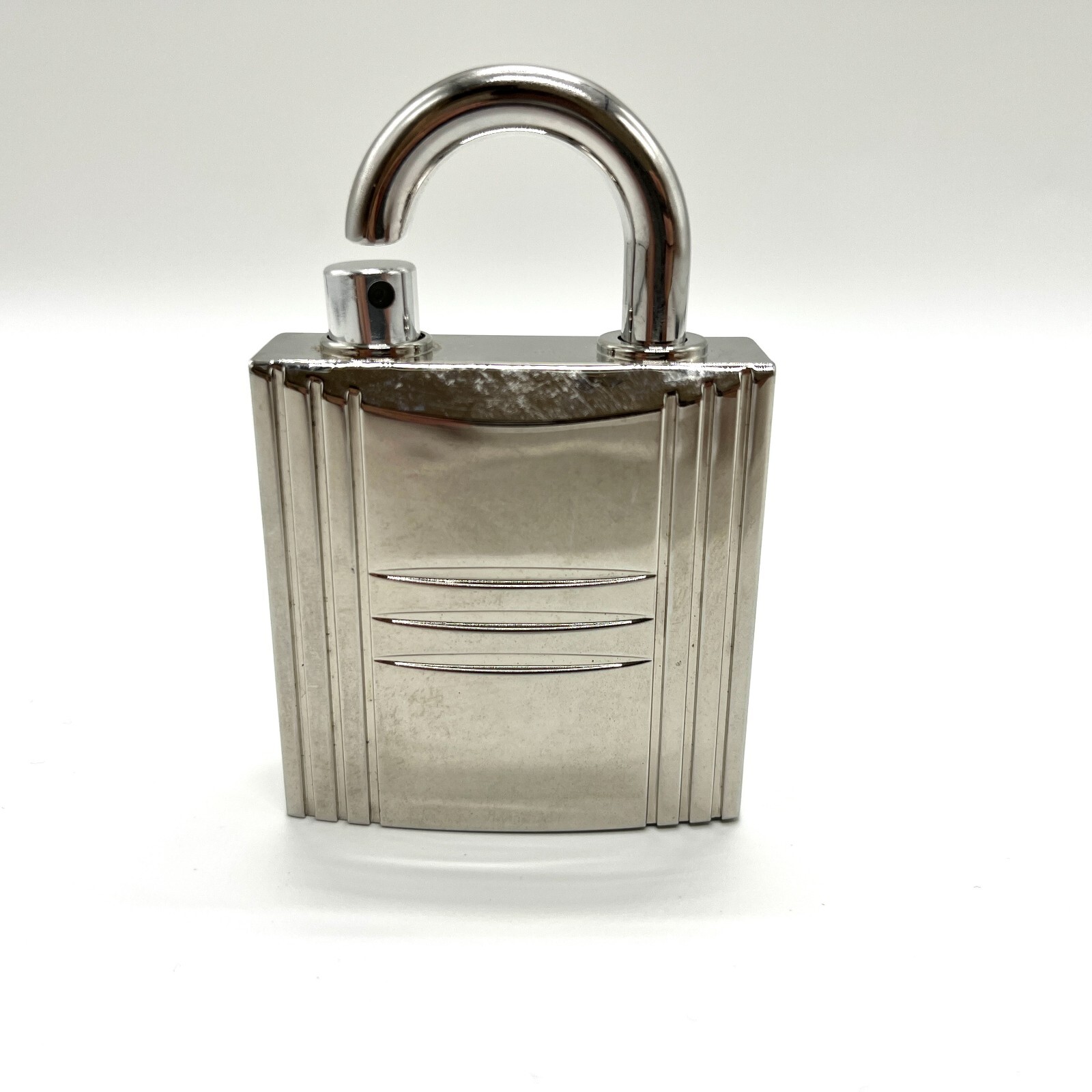 Hermes Perfume Jewel Lock Cadena Motif Metal No box, almost no perfume.
