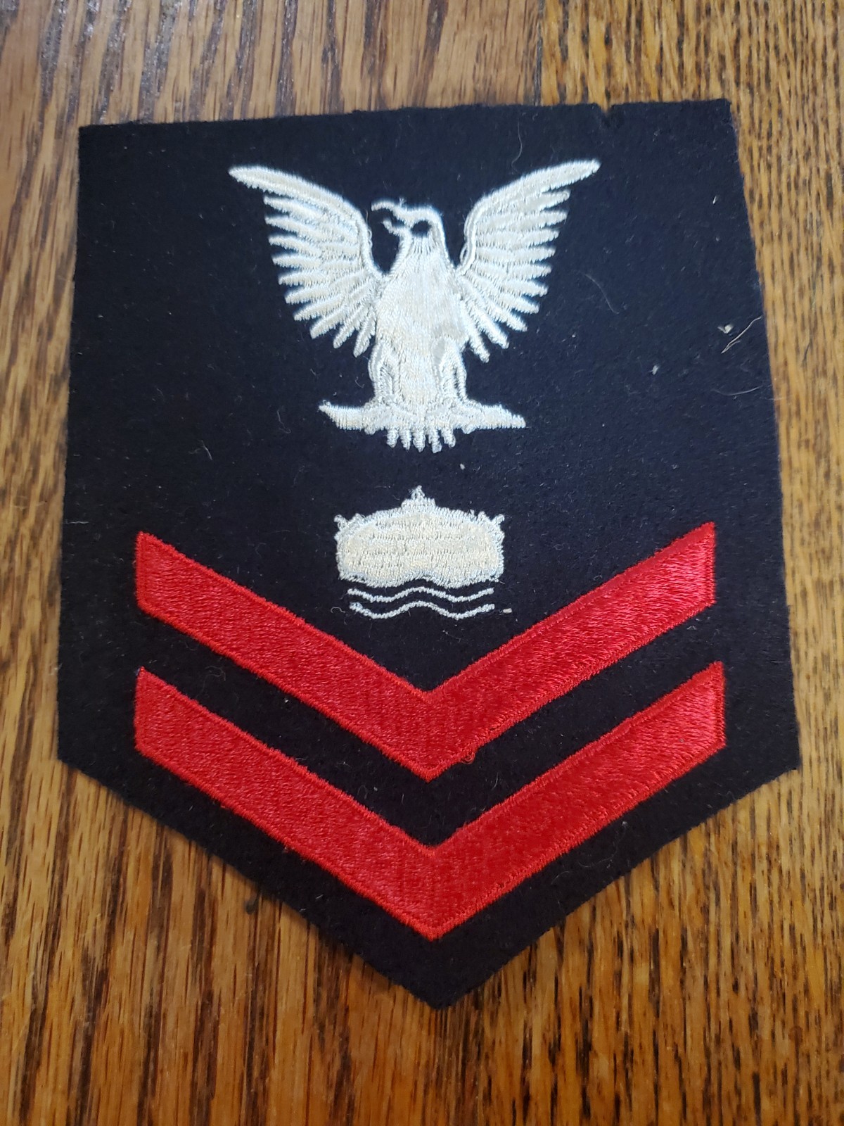 WW11 U.S. Navy Petty Officer Second Class (PO2) rating badge for the Missile...