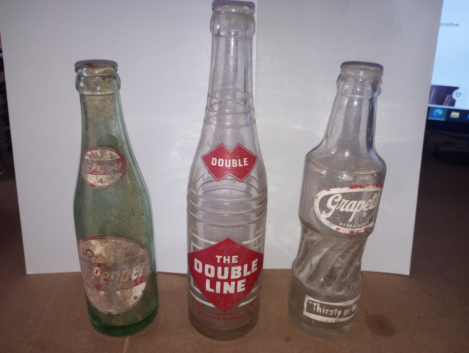 Vintage soda bottles Dr. Pepper, The Double Line, Grapette