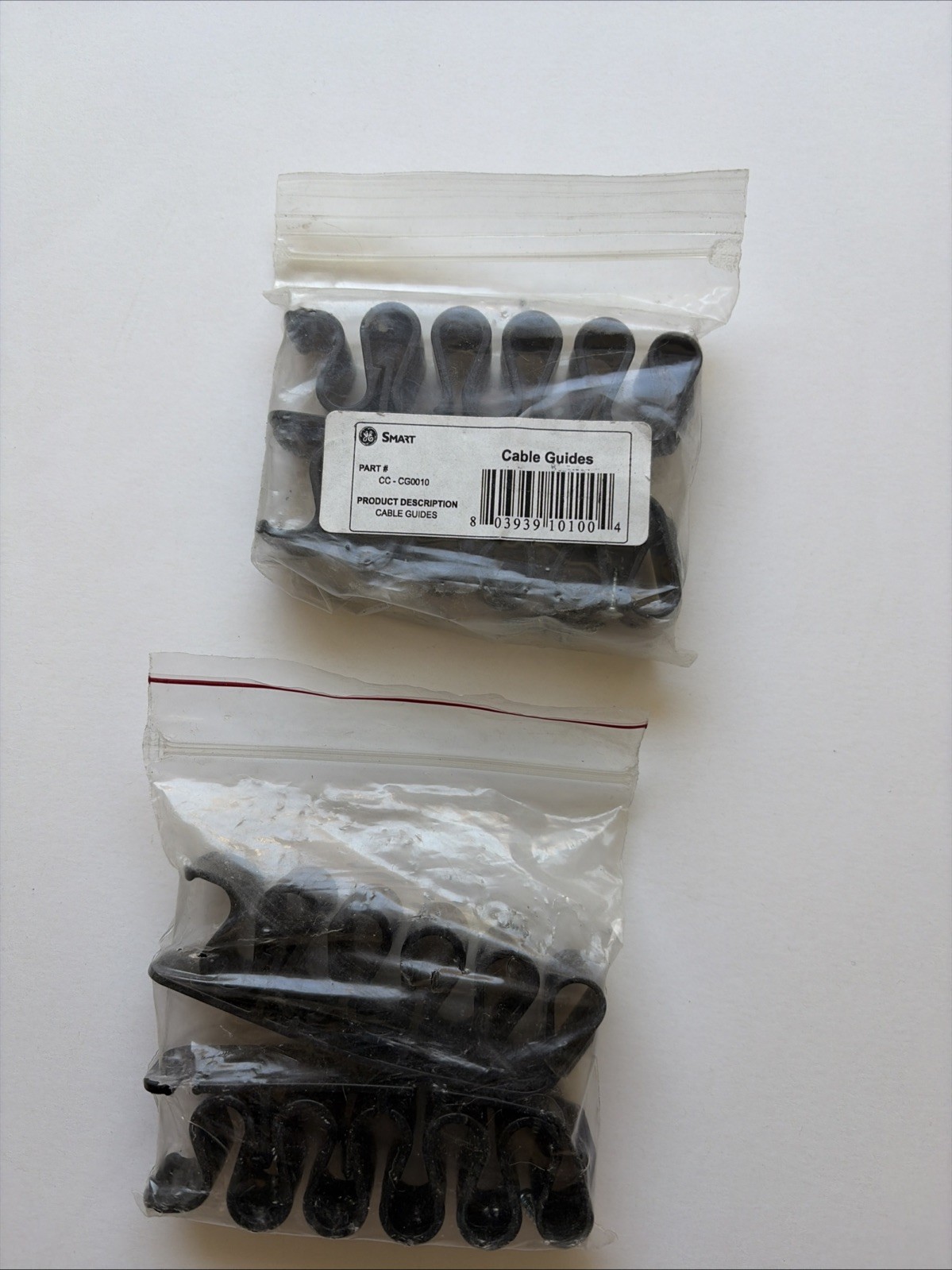 GE SECURITY CC-CG0010 CABLE GUIDES NEW PACKS