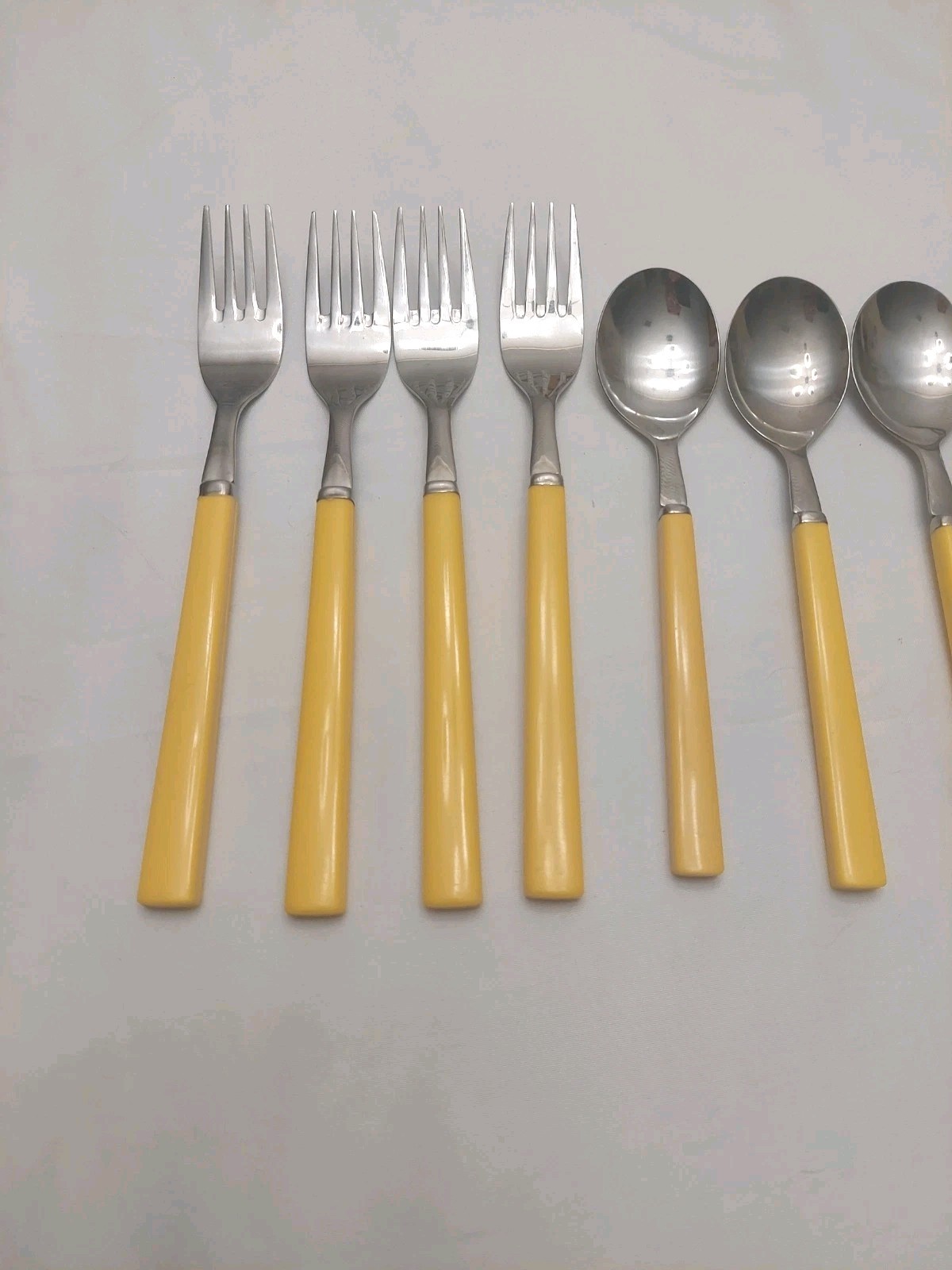 Vintage 16 Piece Anacapa Yellow Melamine Handle Stainless Flatware