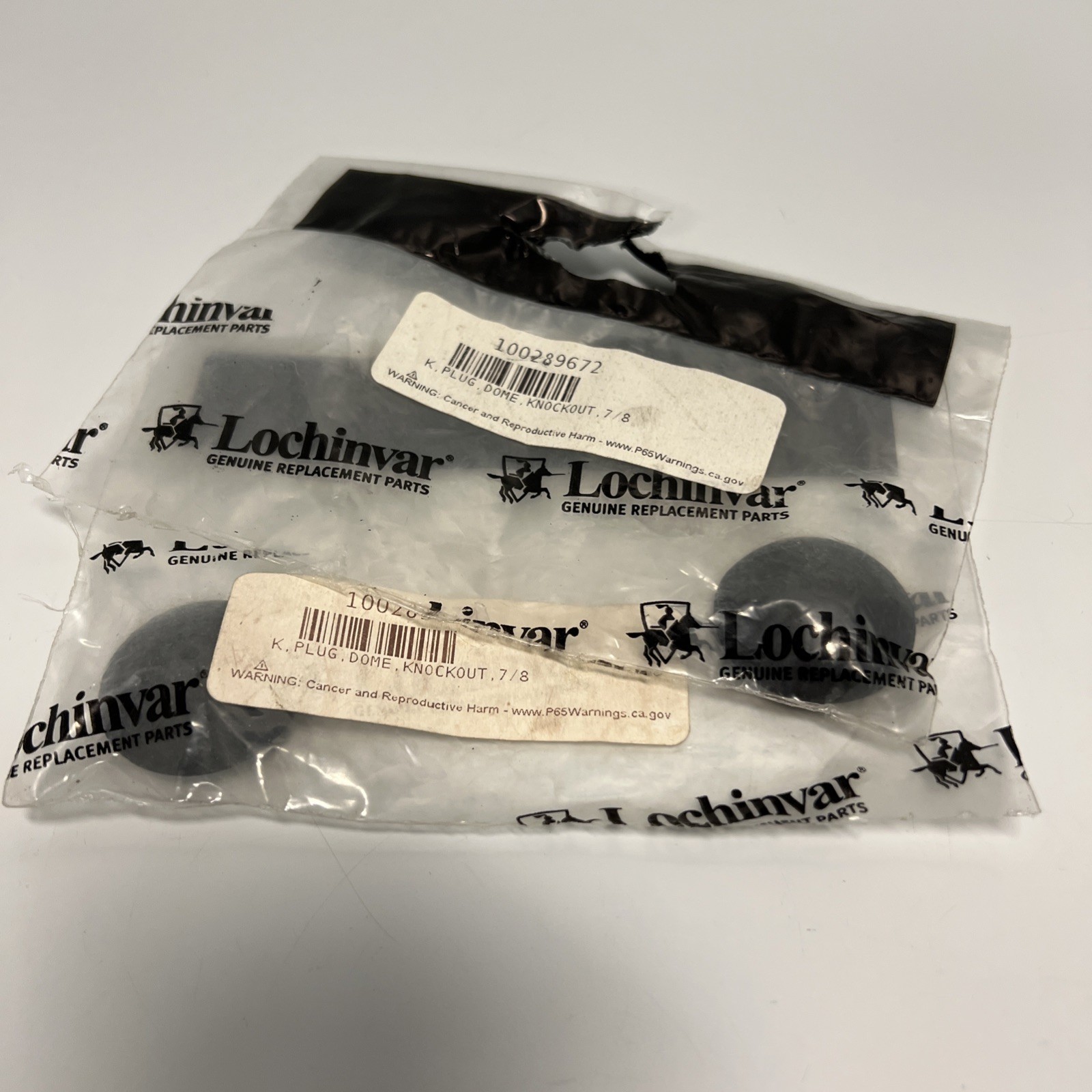 NEW, LOT OF 2, LOCHINVAR, 100289672, 7/8 INCH KNOCKOUT DOME PLUG. (2D-3)