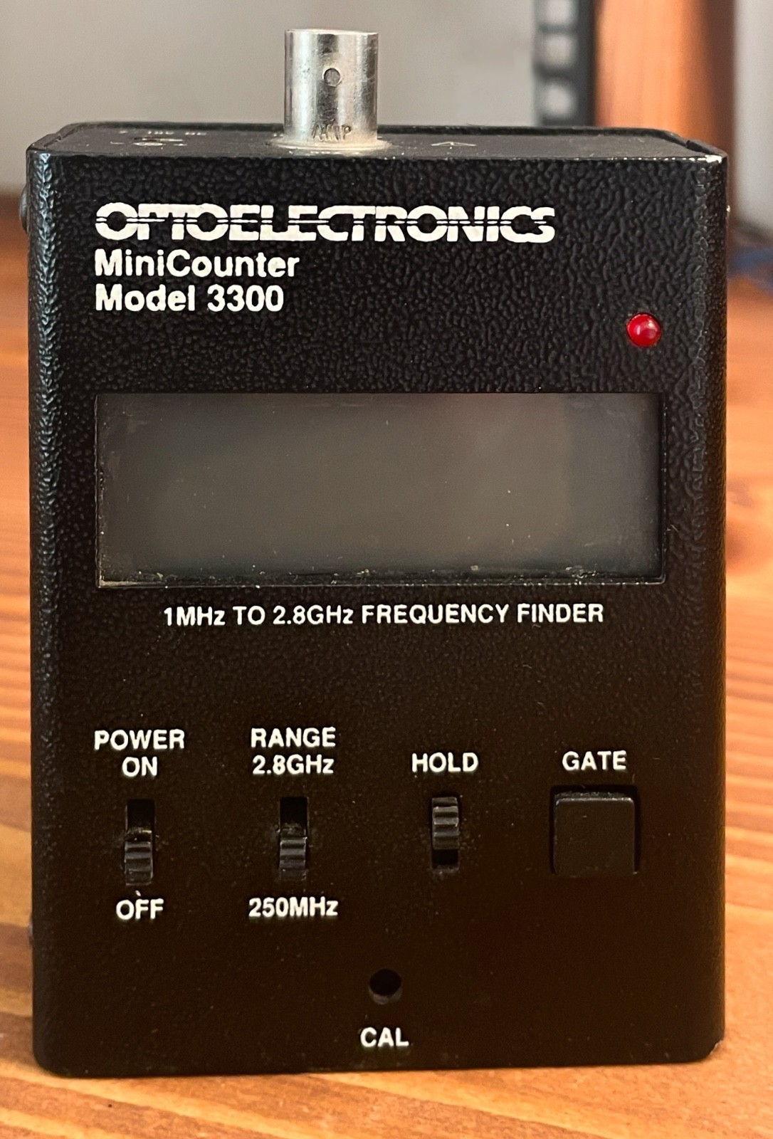 Optoelectronics Hand-held frequency counter Model 3300 - New Battery/ Works 100%