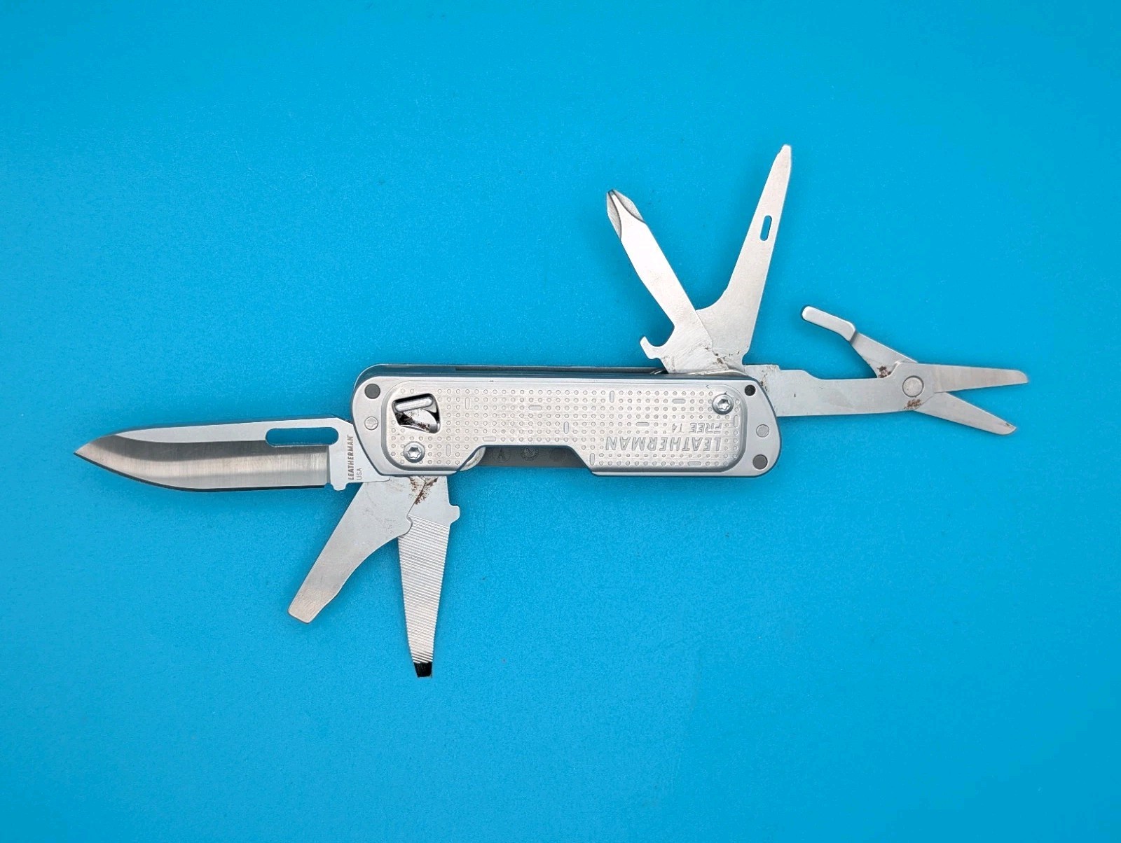 Leatherman FREE T4 Pocket Knife Multi-tool! Stainless! RETIRED!