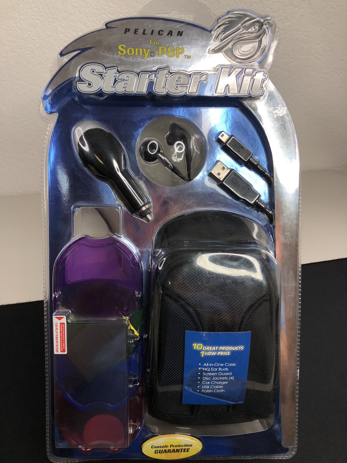 Sony PSP Pelican Starter Kit 10 Items Case Charger Cloth USB Buds UMD Cases Rare