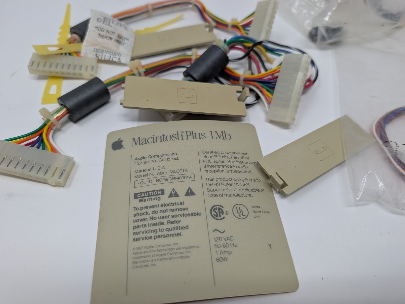 Assorted Mac Plus Parts (Cables, bezels, and whatnot)