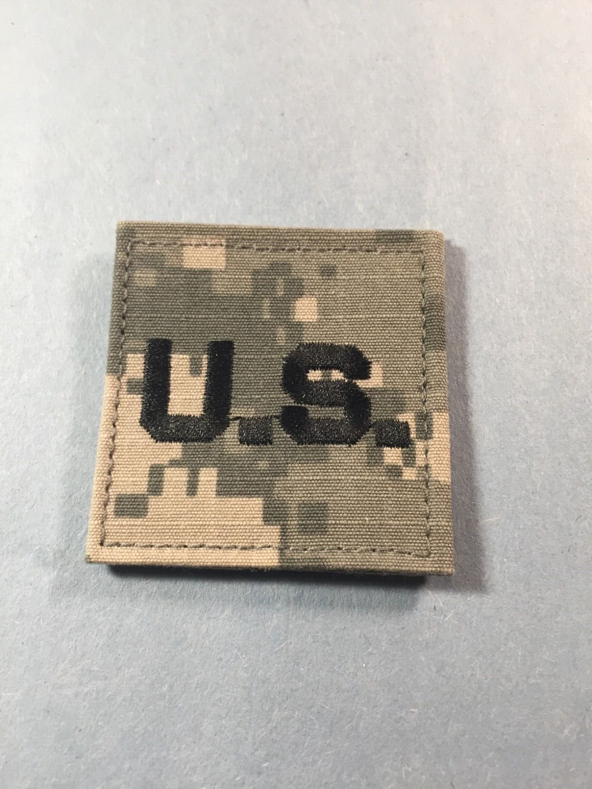 US Army Officers "US" cloth 1 pc (hooks)