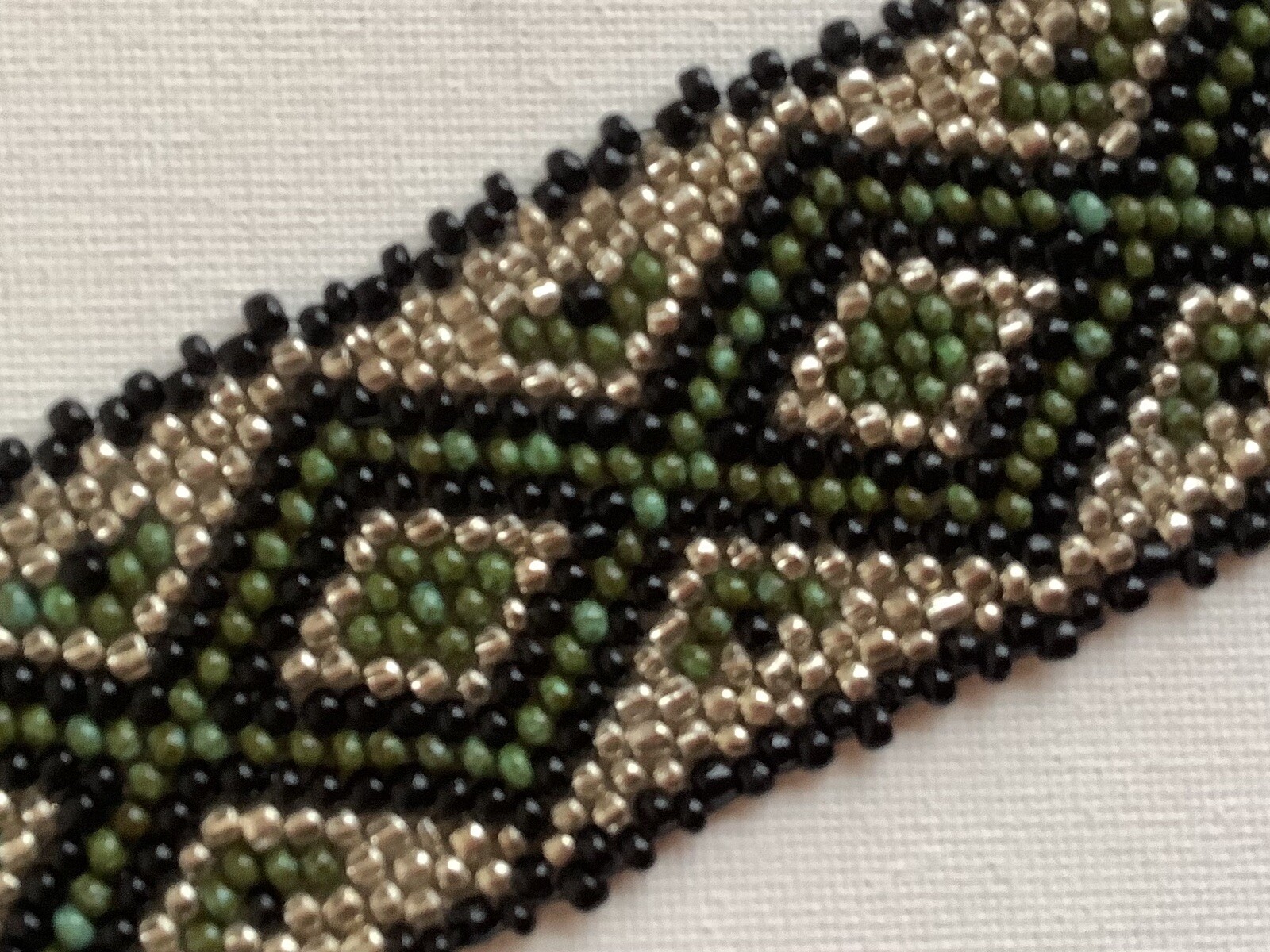 Handmade Beadweaving multicolor bracelet with silver tone toggle closure