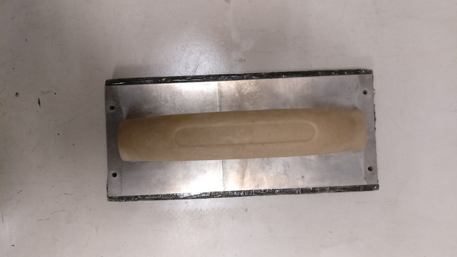 Eight assorted drywall/mud tools
