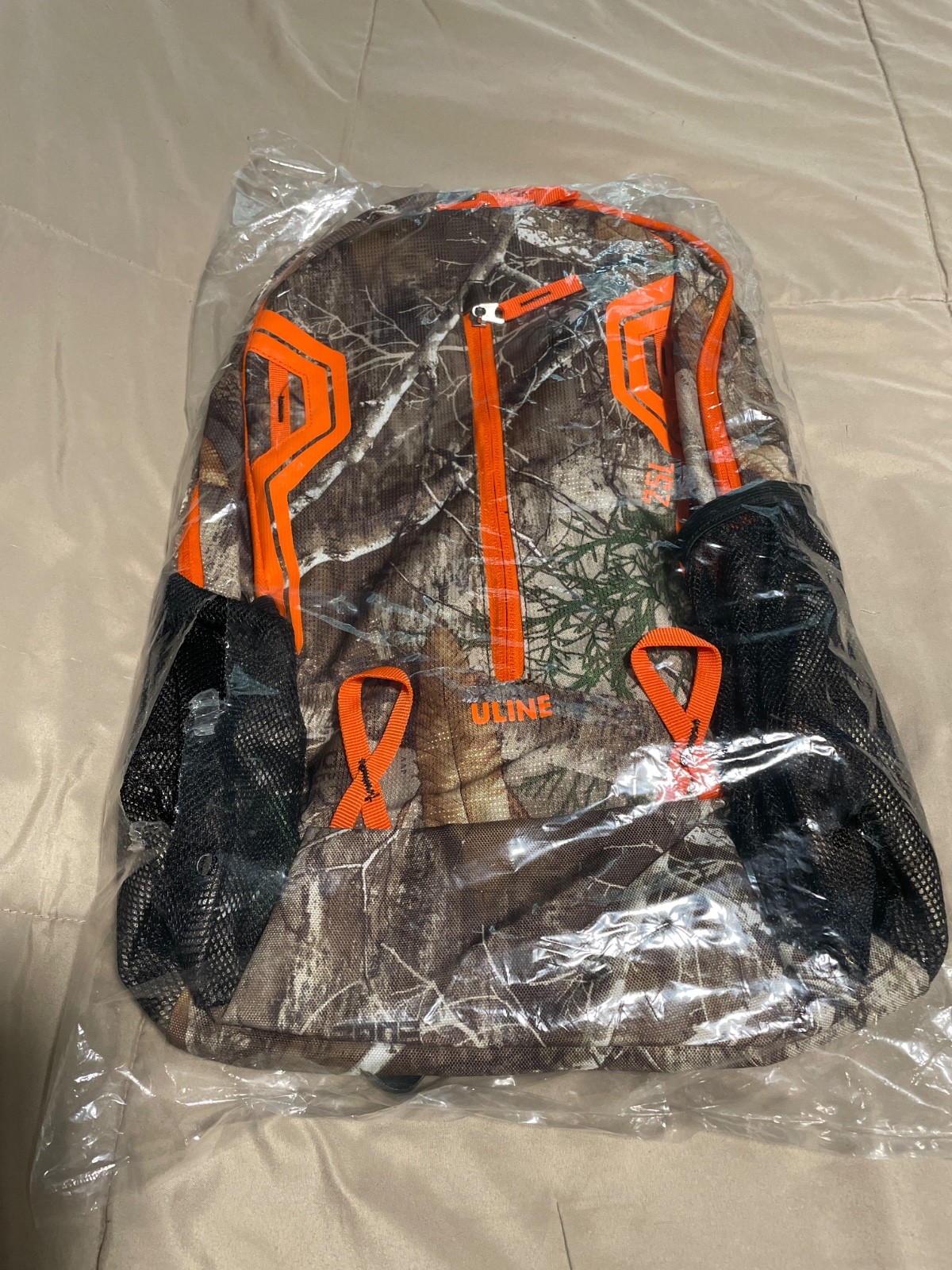 uline backpack new in package, regular size camouflage green with orange