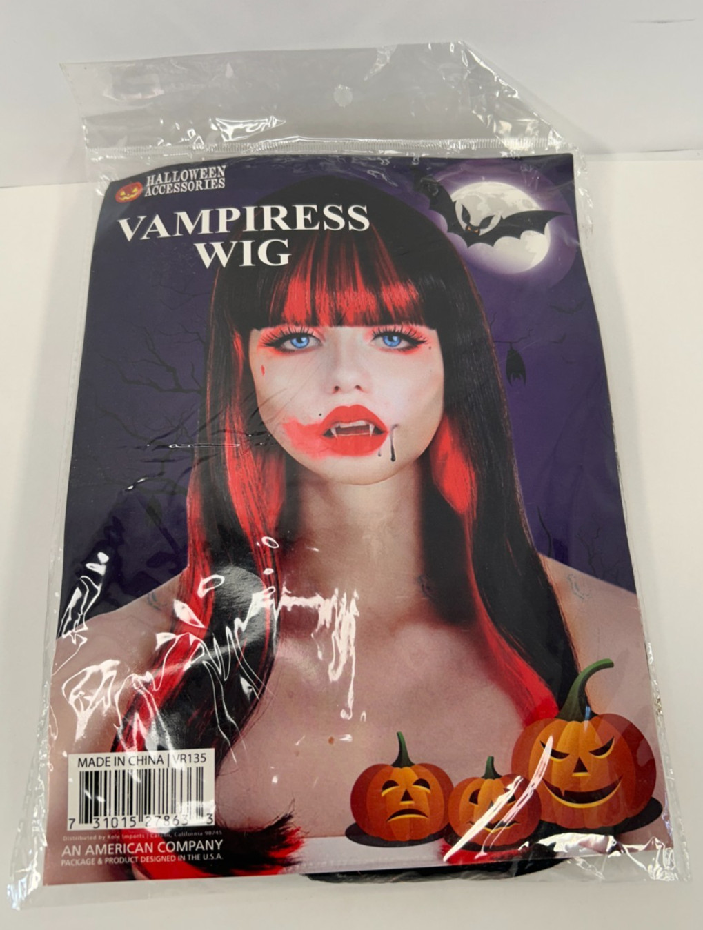 Halloween Vampiress Wig Is 23.5” Long  Black & Brite Red Hair New Opened Package