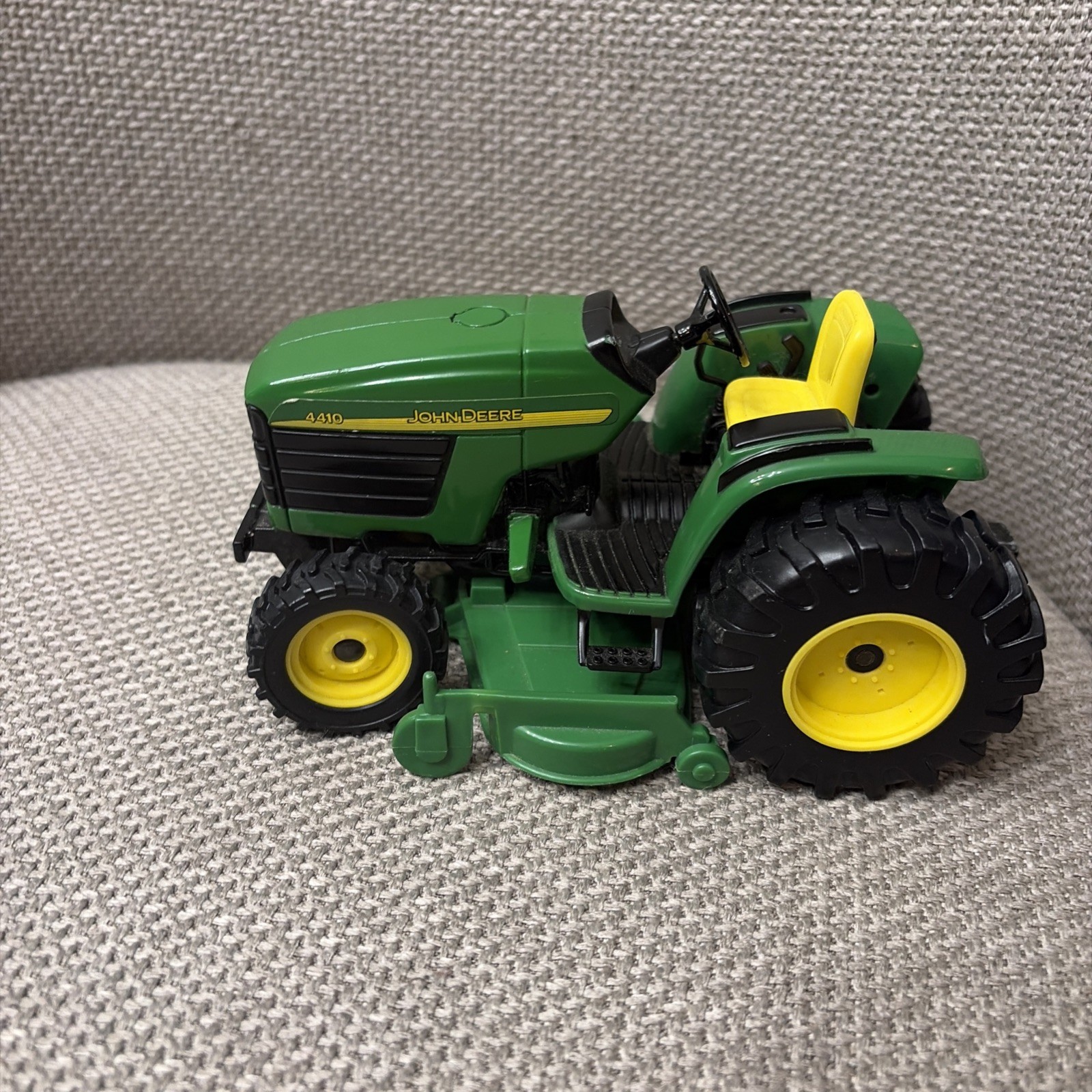 ERTL JOHN DEERE DIECAST 4410 TRACTOR W/ROTARY CUTTER, HEAVYWEIGHT, MISSING BAR
