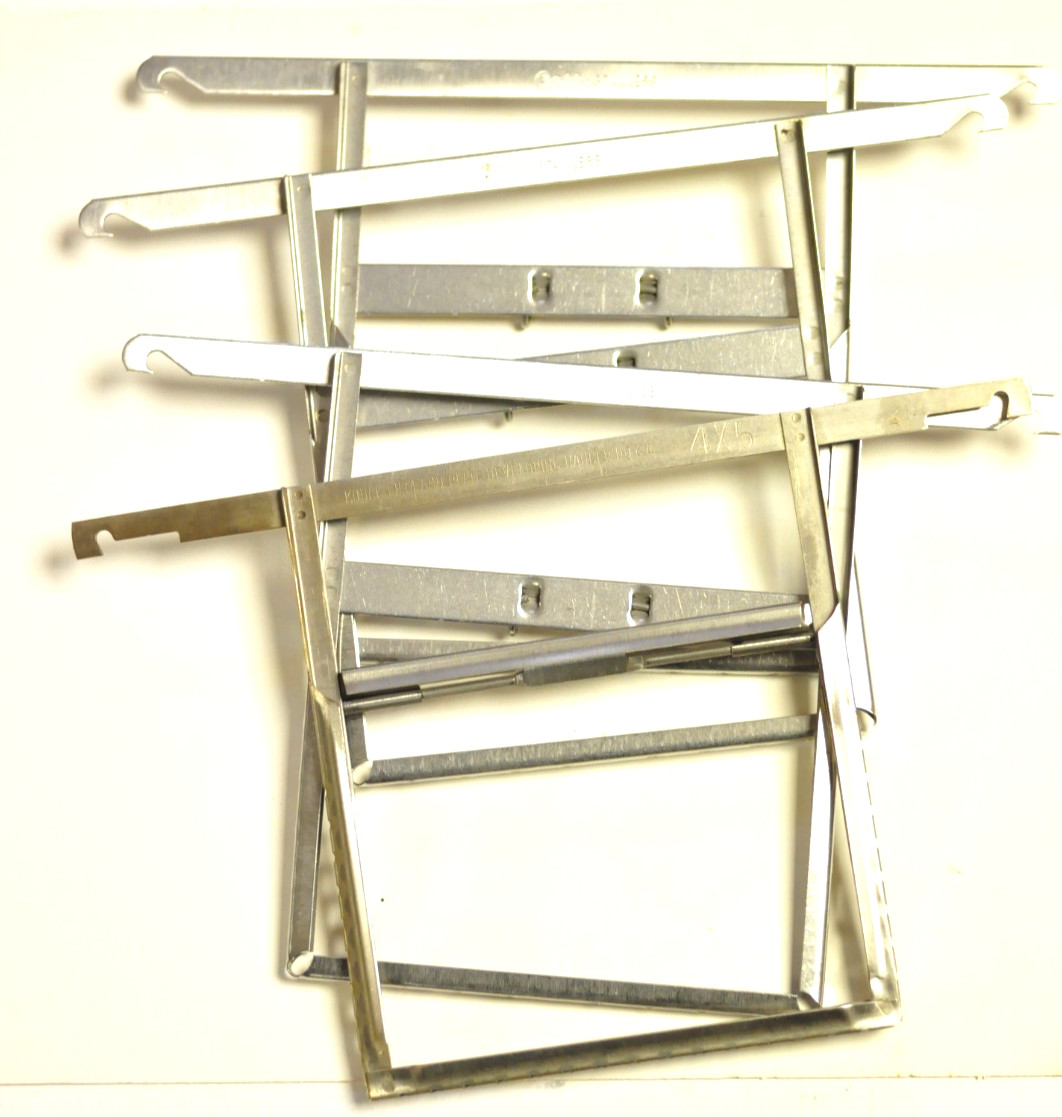4-(four) 4 x 5" stainless steel cut film hangers. 3-Carr & 1-Kodak.