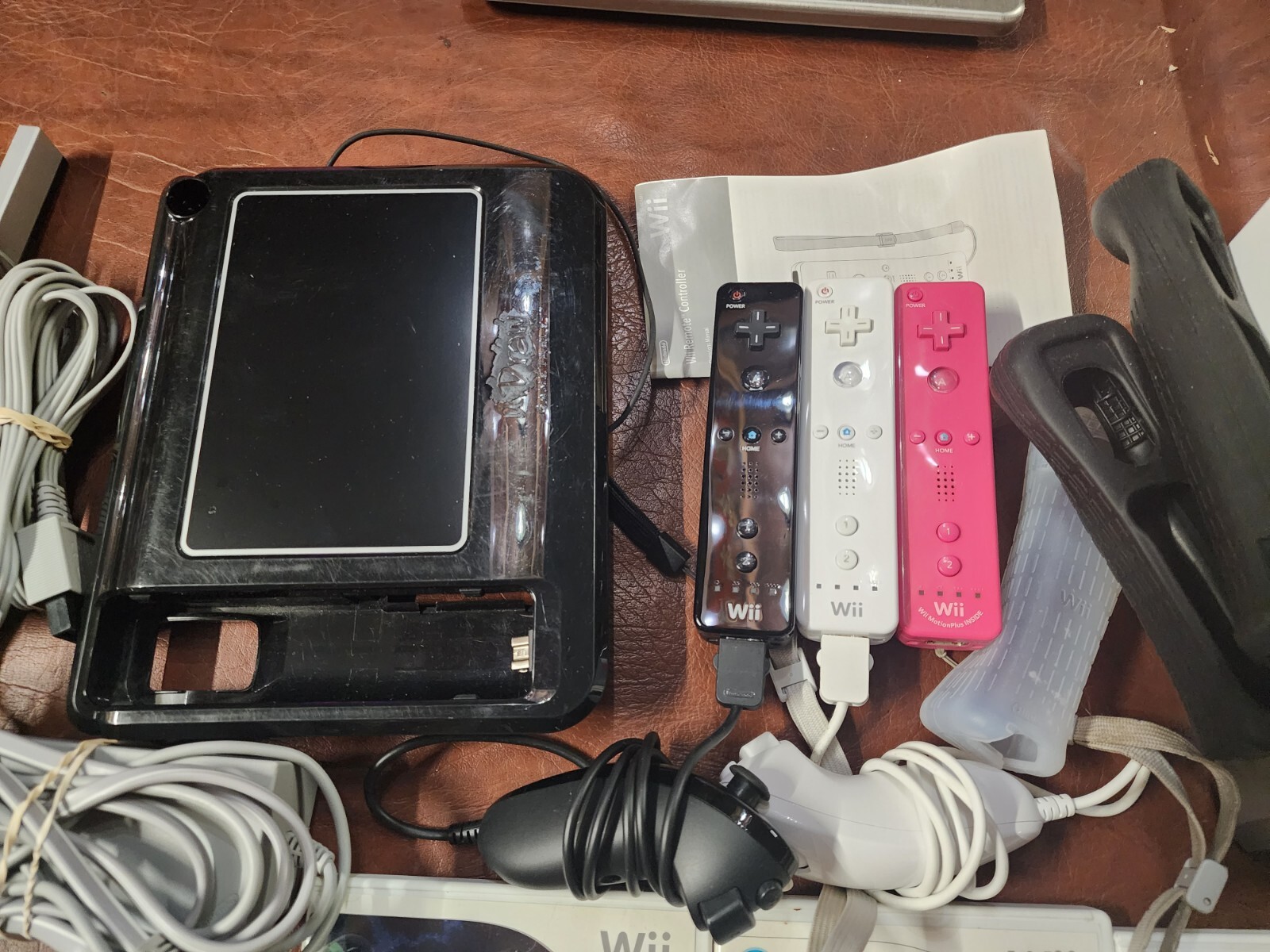 Wii Console plus, 9 games, 2 remotes, 1 nunchuck, System Plus Hookups & More
