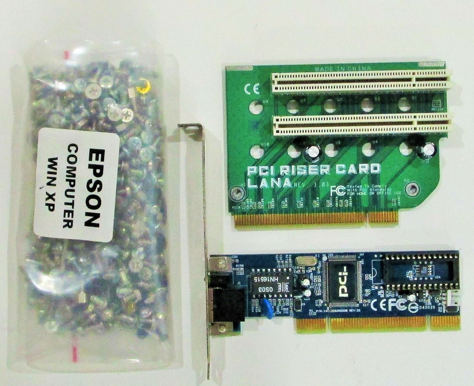 LAN card FNW-9803-T - PCI RISER CARD - plus assorted computer screws