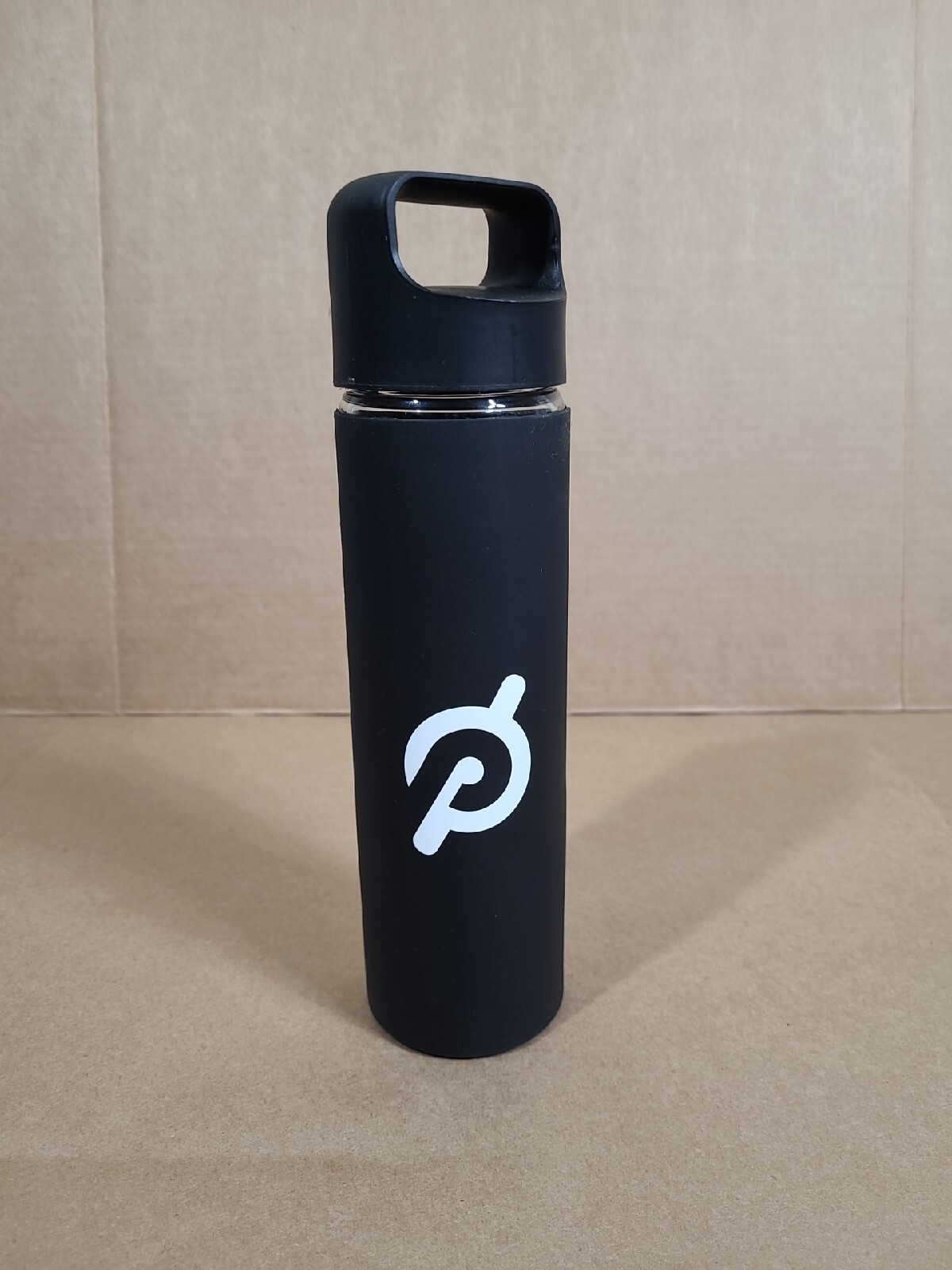 Peloton Glass Water Bottle with Non Slip Grip and Screw Top