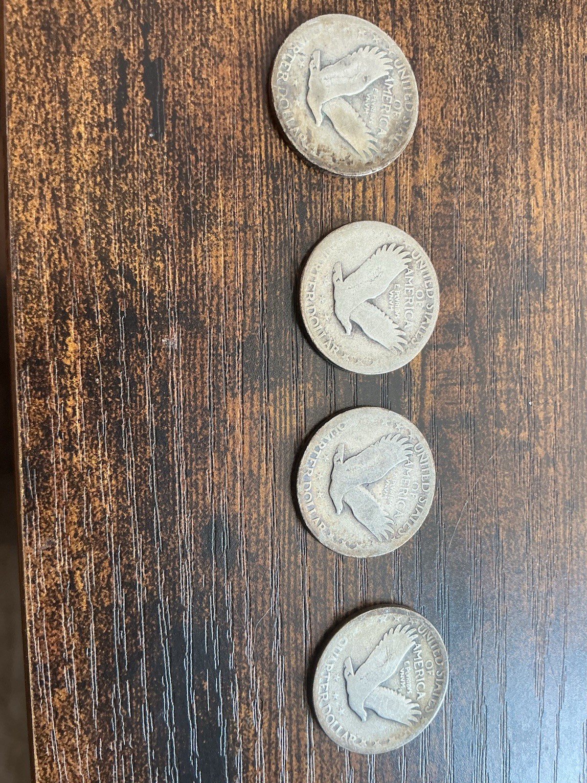 (4) 1927 Liberty Standing Quarters