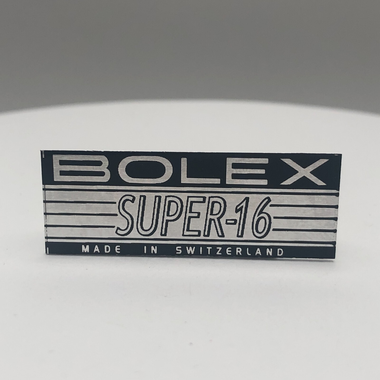 BOLEX 'SUPER-16'  LOGO PLATE BADGE'  (Glue-In)  for BOLEX H16 16mm movie camera