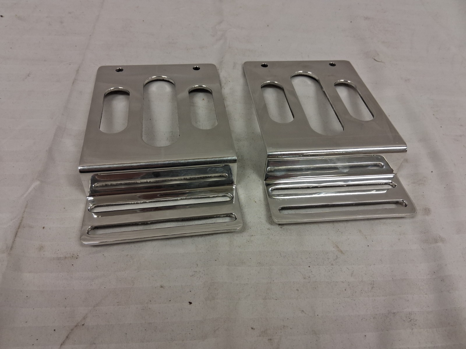 Misc. polished aluminum brackets