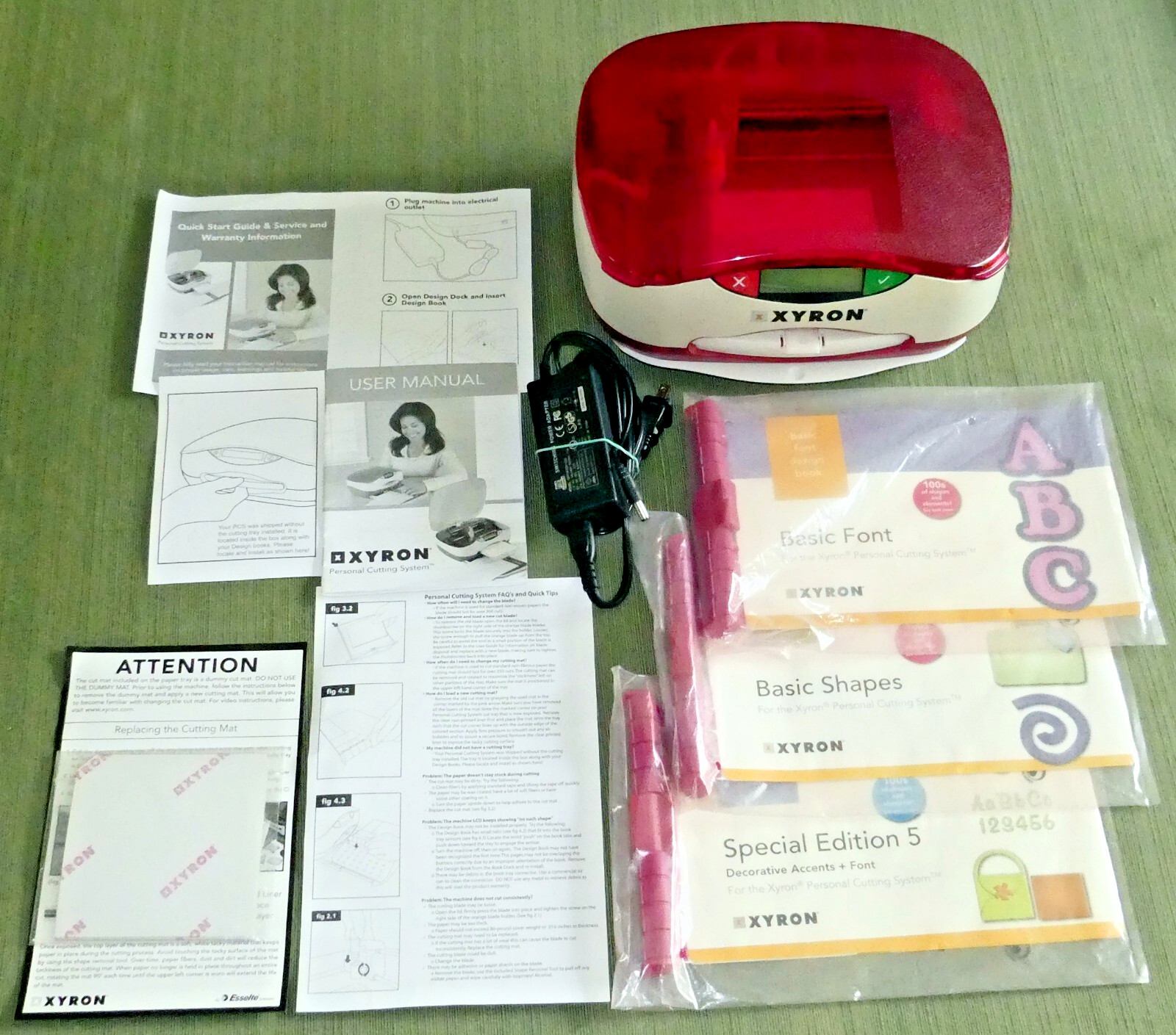XYRON PERSONAL CUTTING SYSTEM w/POWER CORD, 3 DESIGN BKS,  4 EXTRA MATS, MANUALS