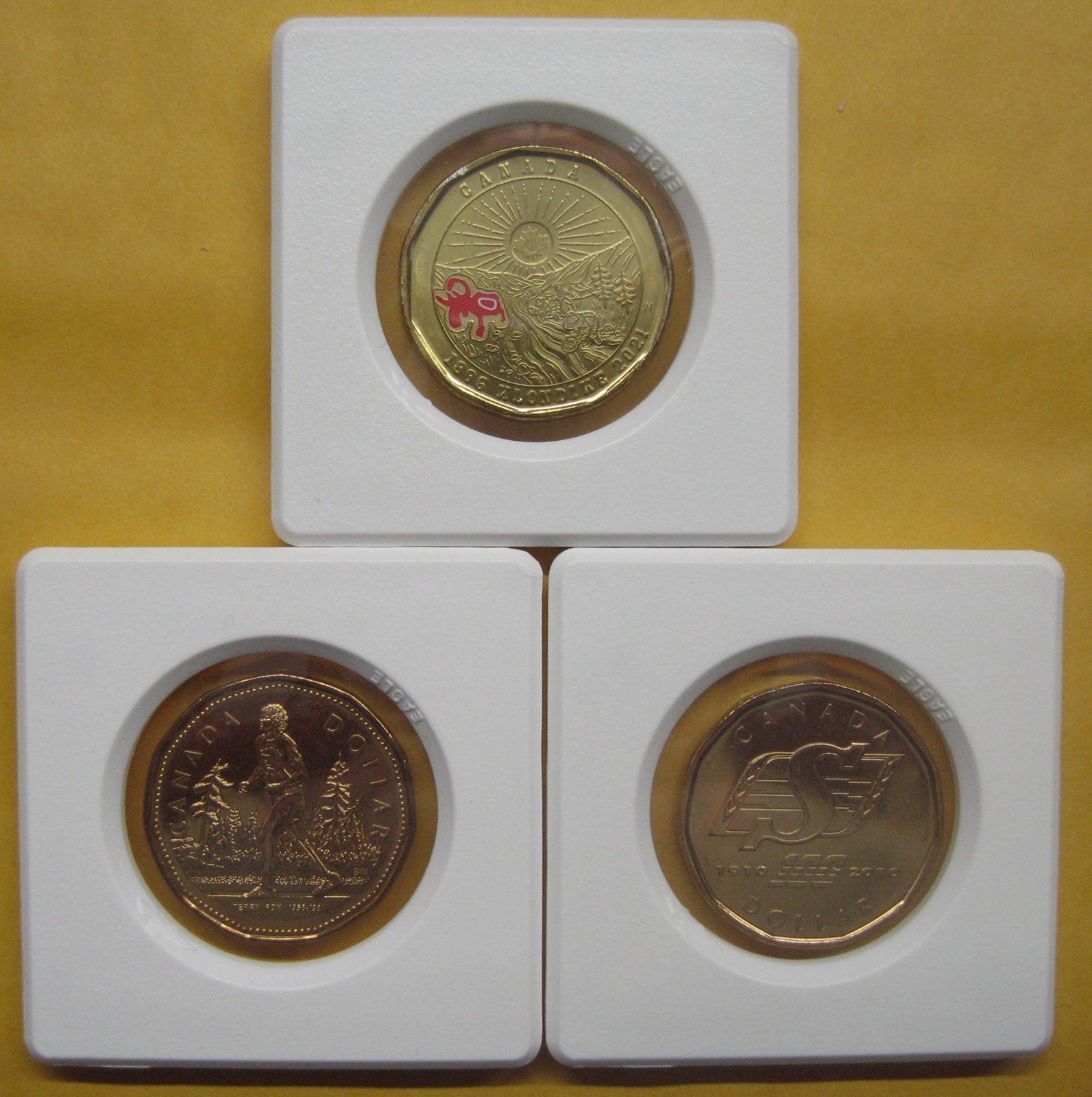 Lot of 3 Canada Dollars Take a look