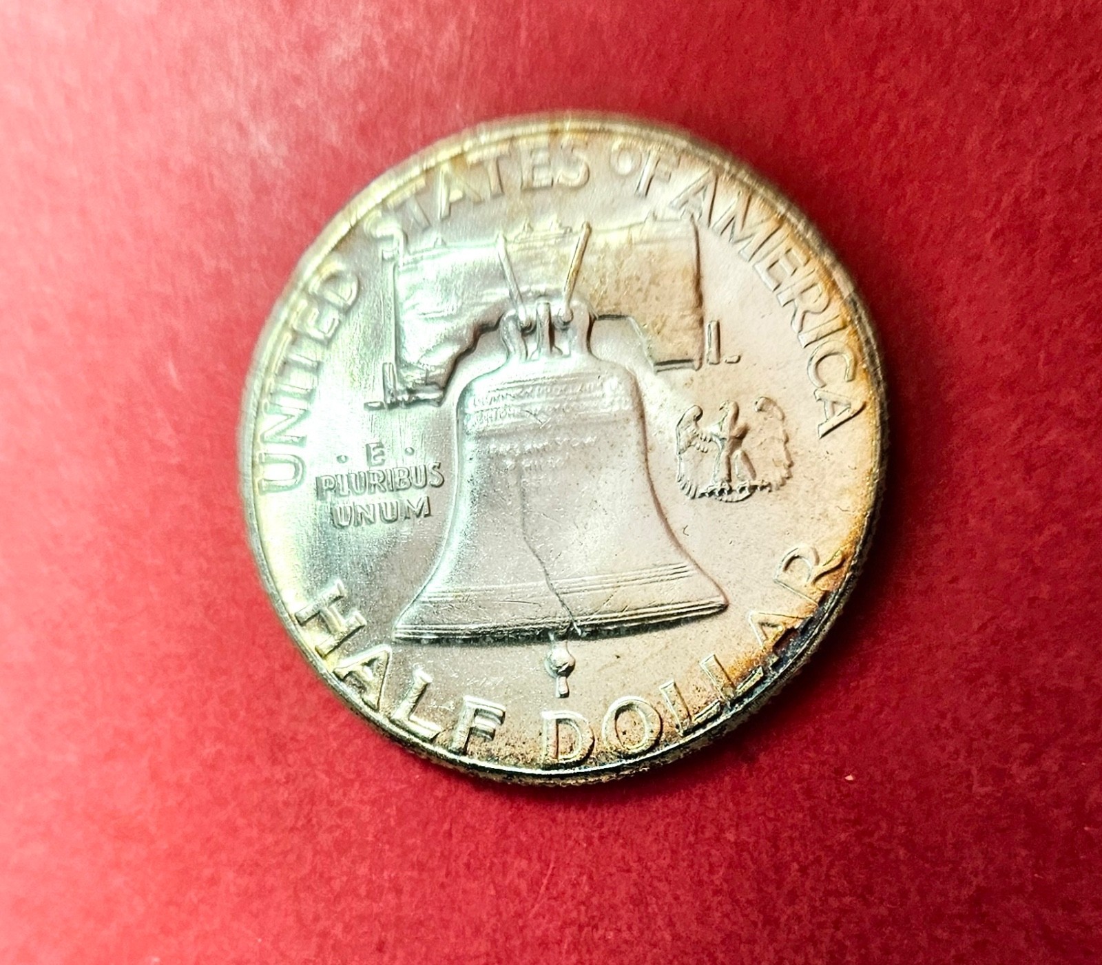 1958 Franklin Silver Half Dollar. Uncirculated. Toned.