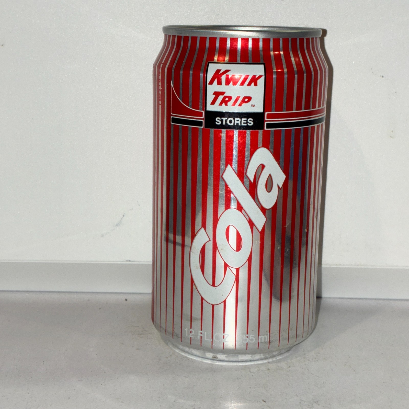 Kwik Trip Cola Soda can, bottom opened