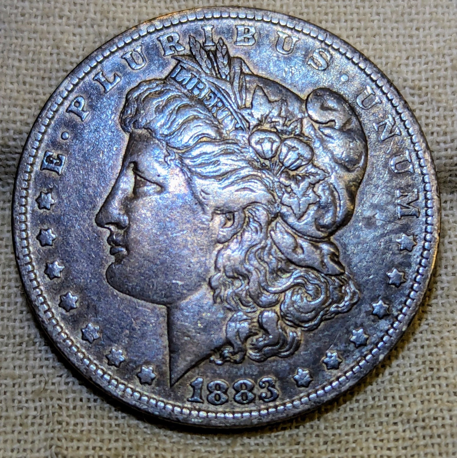 1883 O Morgan Dollar VF/XF : Colorful Tone, New Orleans Mint - .9 Fine Silver