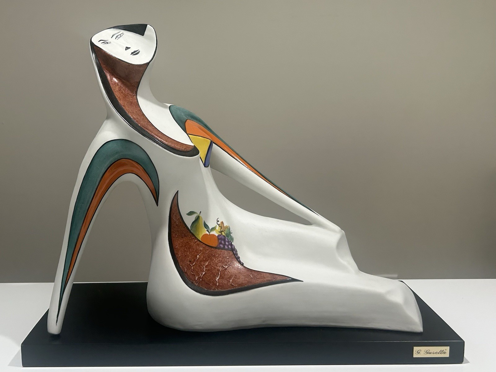 Gusella Abstract Sitting Figure Sculpture with Fruit Motif