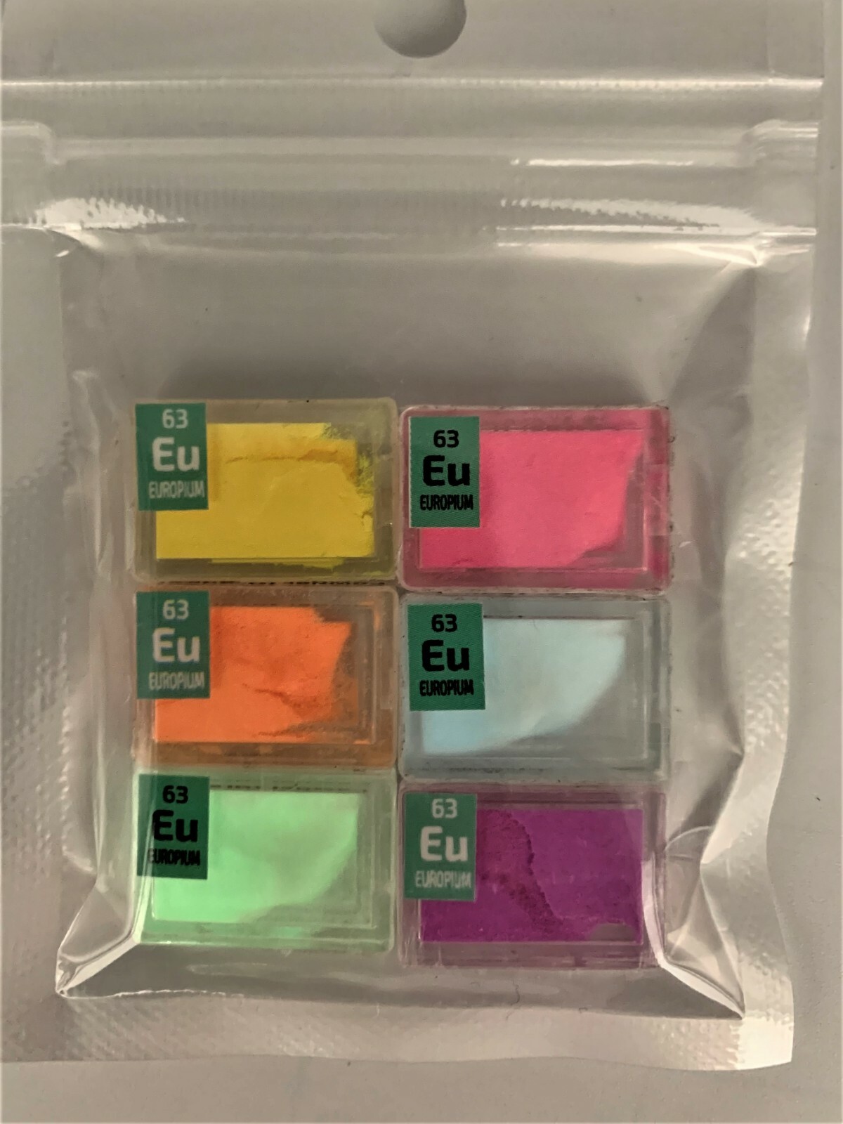 Europium Glow Powder Set in Mini PEGUYS Periodic Element Tiles - 6 tiles.include
