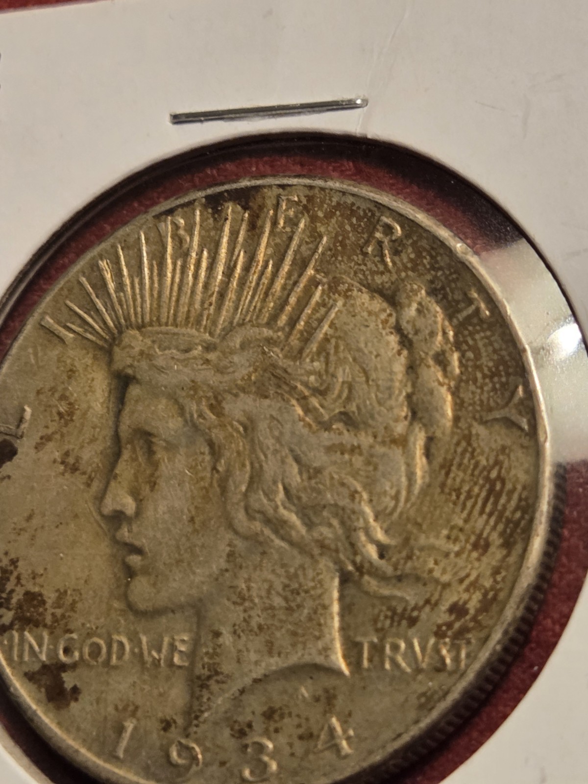 1934 SILVER PEACE DOLLAR IN NICELY CIRCULATED CONDITION