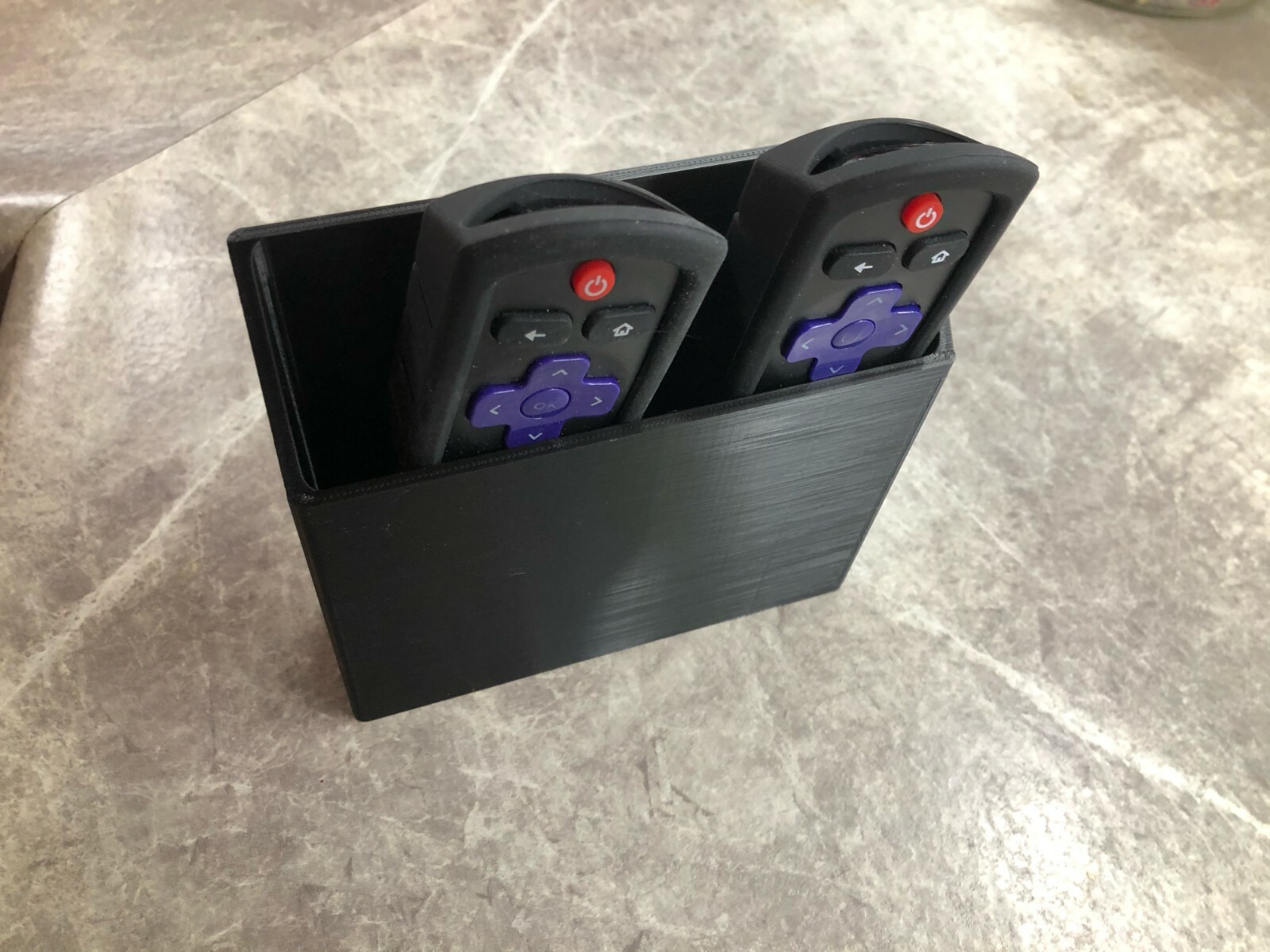 Wall Mount Bracket for 2 remotes.