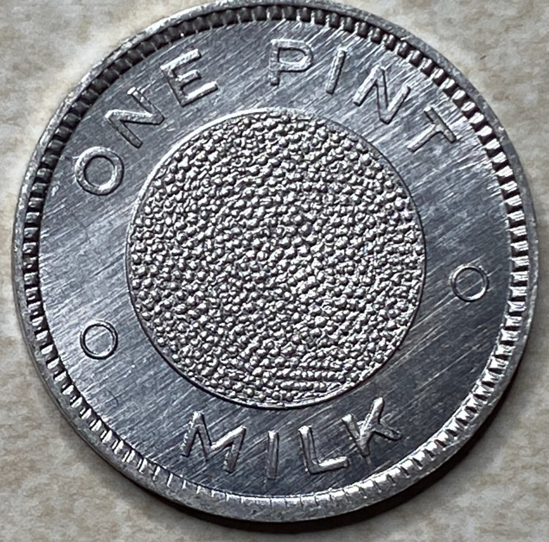T9104 One Pint Milk, Unknown  Anillo Restrike Arcade Token