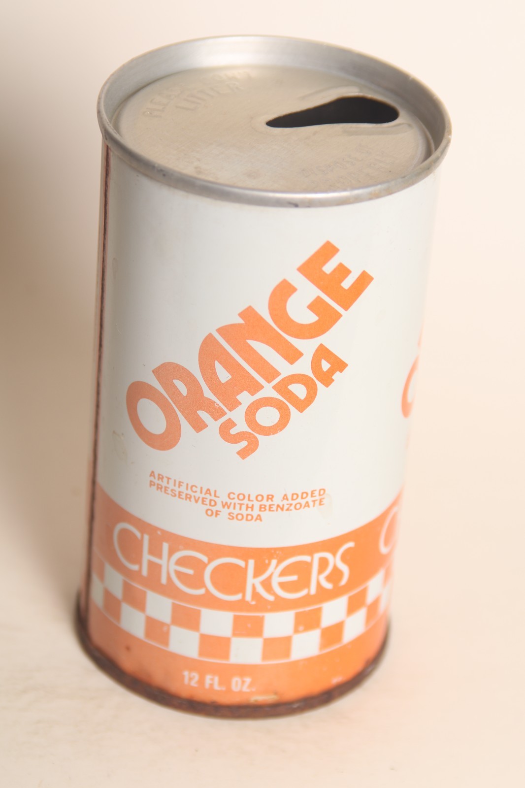 Checkers Orange soda can