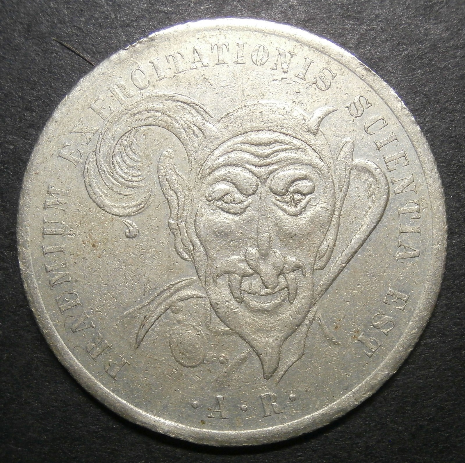 USA - Magician's token "Praemium Exercitationis Scientia Est" August Roterberg
