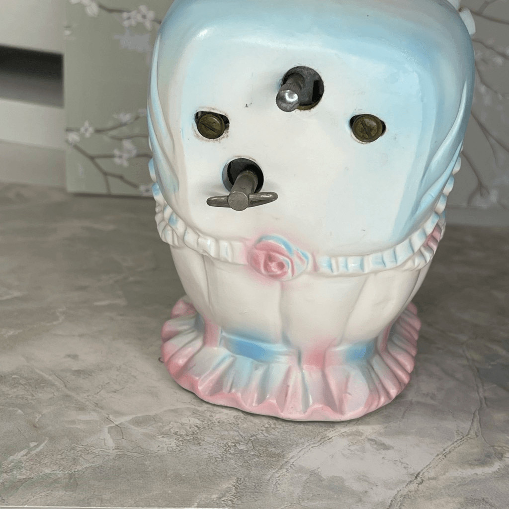 Inarco E- 3502 musical baby bassinet planter.