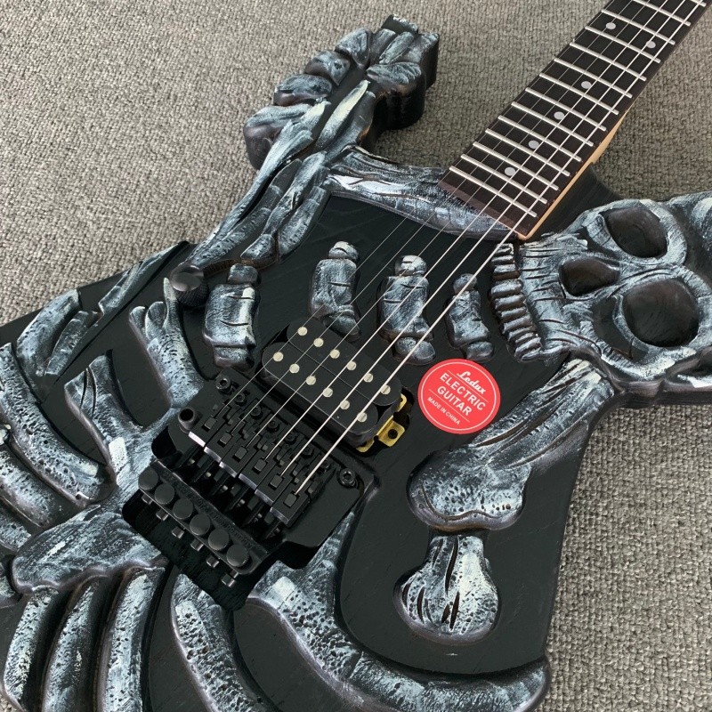 Left Hand Skull Solid Electric Guitar Rounded Fret Edge Maple Neck Hard Rock