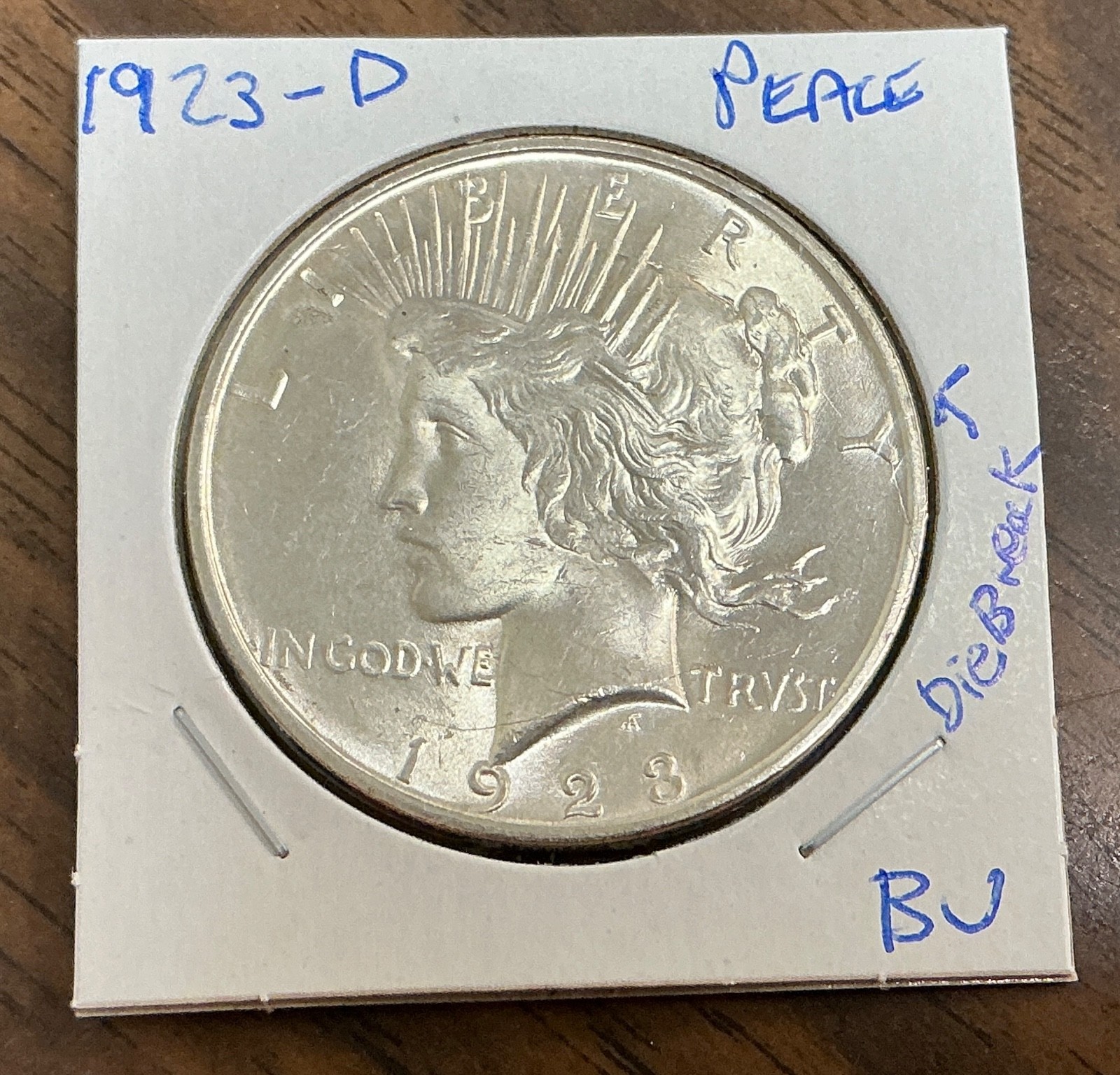 1923-D - $1 Peace Silver Dollar - BU - Die Breaks